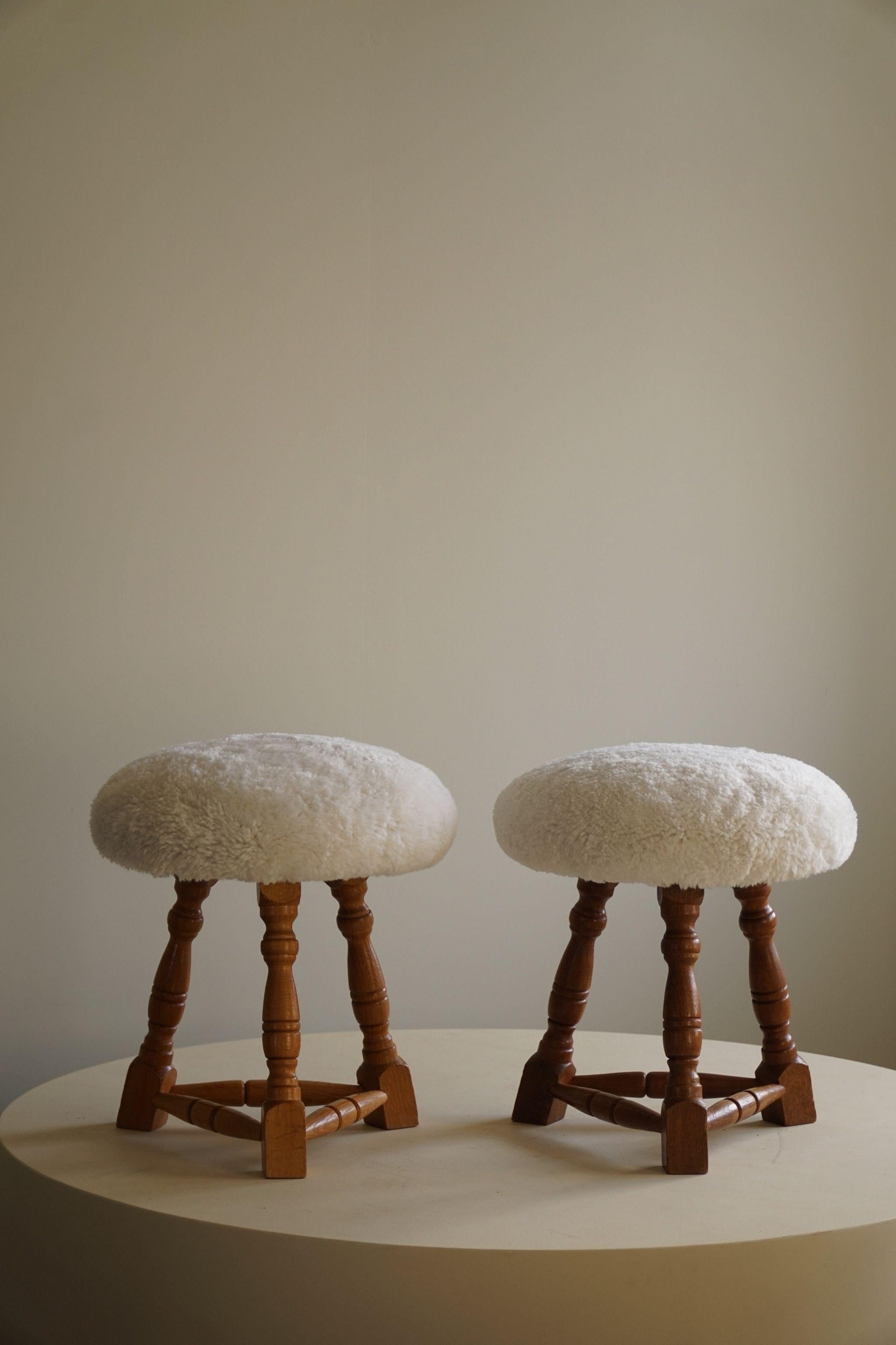 Danish Modern, A Pair of Tripod Stools, Reupholstered Seats in Lambswool, 1950s 6
