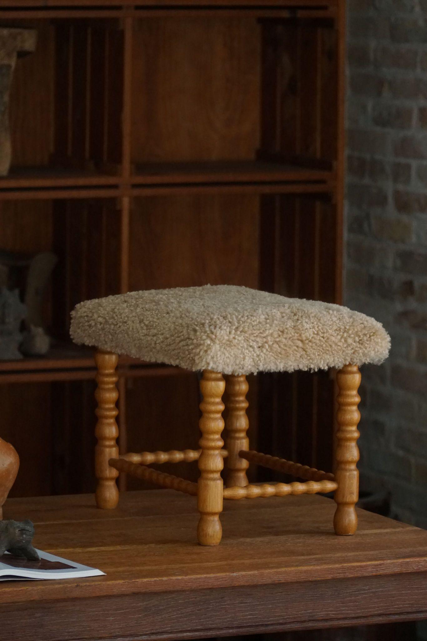 20th Century Danish Modern, A Rectangular Stool in Oak, Reupholstered Seat in Lambswool, 1950