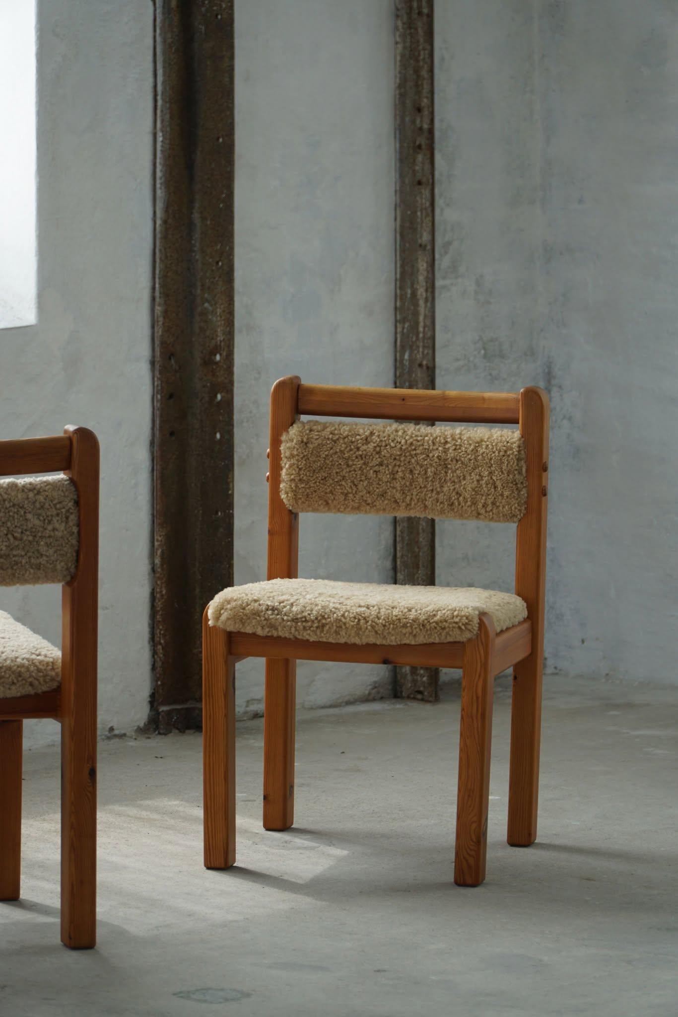 A neat set of 6 sculptural dining chairs in solid pine, upholstered in a fine quality shearling lambswool. Made by T.S.M, Denmark in the 1970s. These chairs have a really strong impression that pairs well with many types of interior styles. A