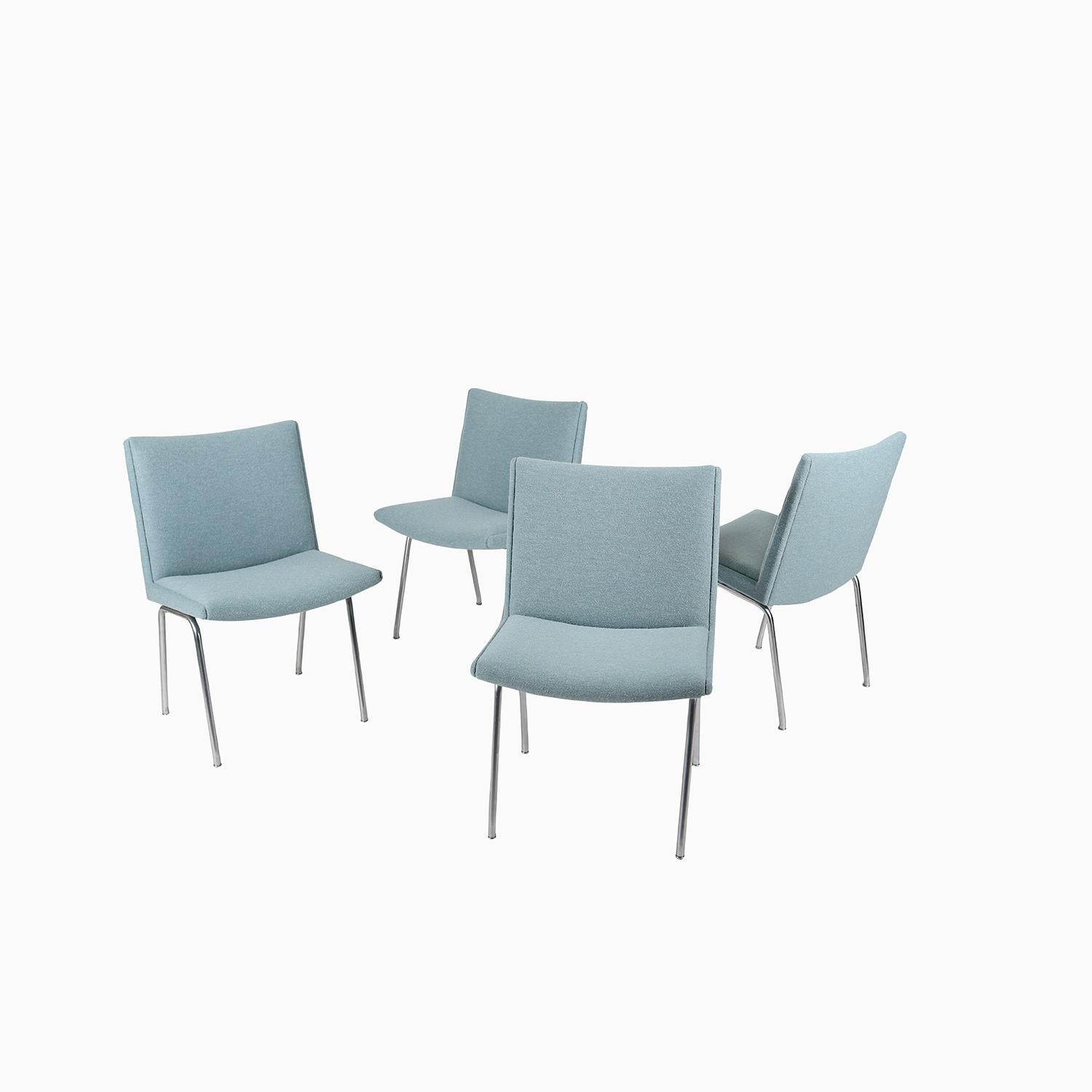 Danish modern “Airport” chair designed by Hans Wegner and produced by AP Stolen. Set has been recently reupholstered in Kjellerup Vaeveri 