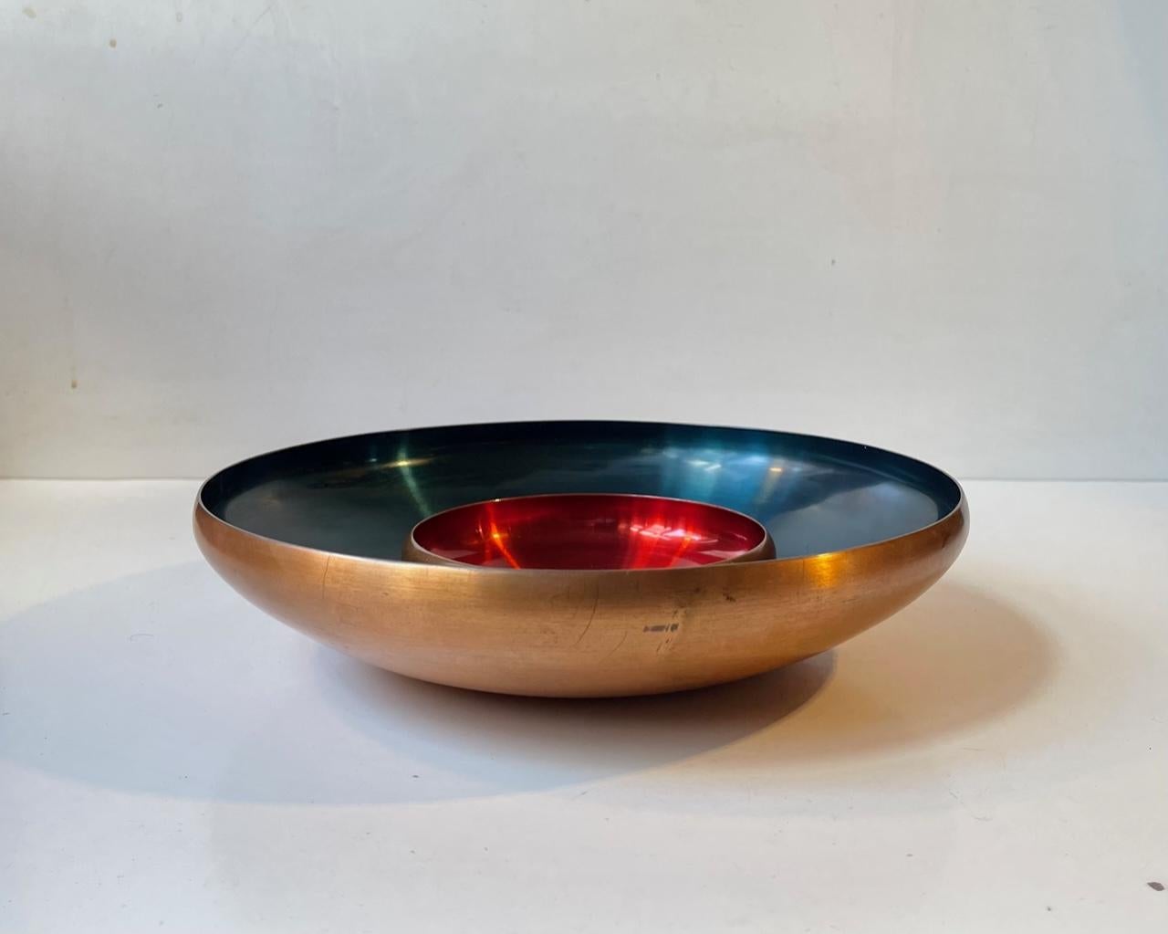 Danish Modernist solid Copper Bowls with interior red and petrol-blue enamel/anodization. Manufactured and designed by Corona in Denmark during the 1960s. Reminiscent in style to similar designs by Torben Orskow, Herbert. Krenchel - Krenit and