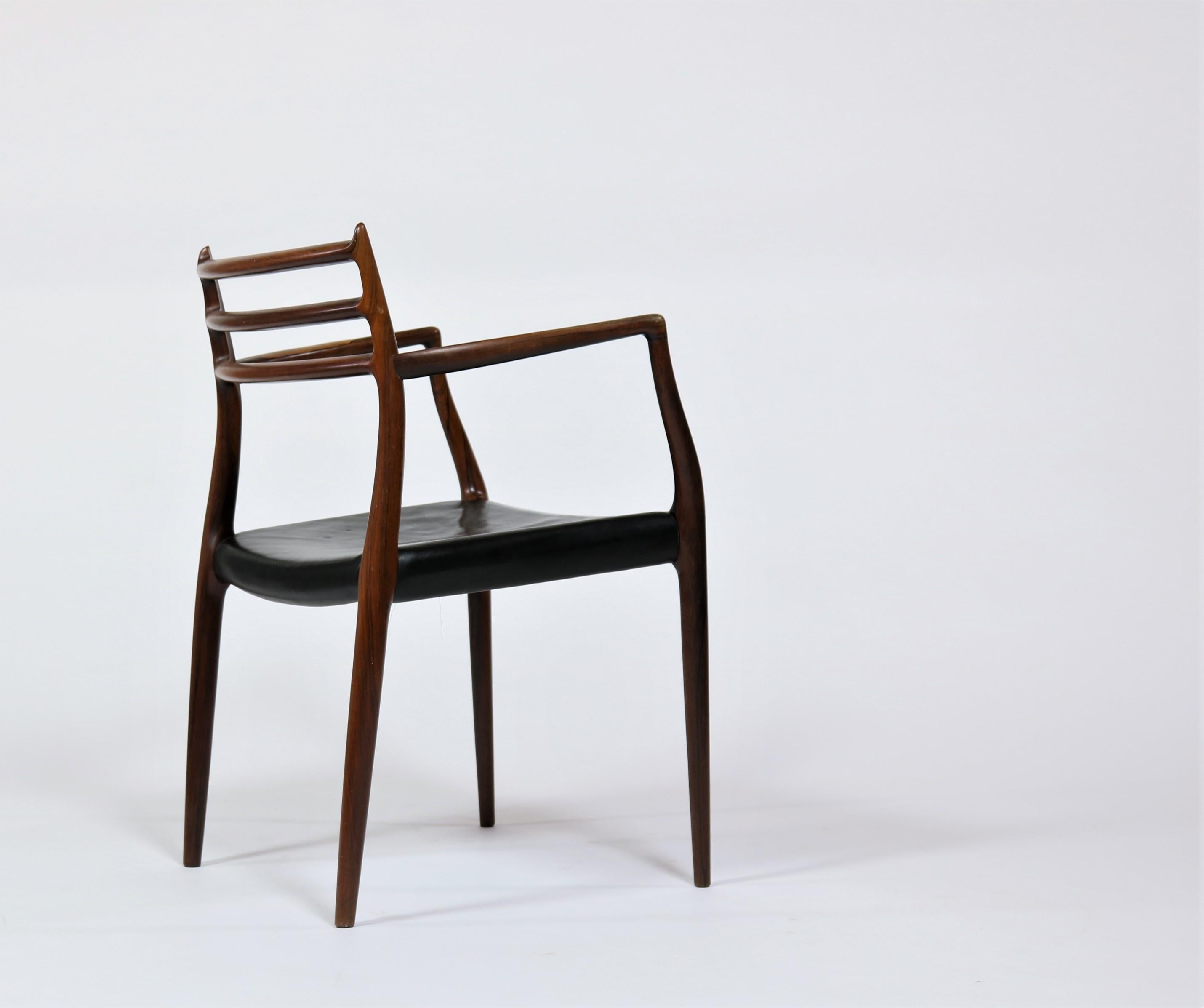 Scandinavian Modern Danish Modern Armchair in Rosewood and Black Leather Model 62 by Niels O. Moller