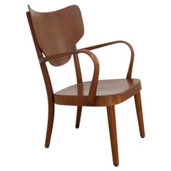 Poltrona in stile moderno danese, modello 2280, disegnata da Magnus Stephensen per Fritz Hansen, anni ’40.