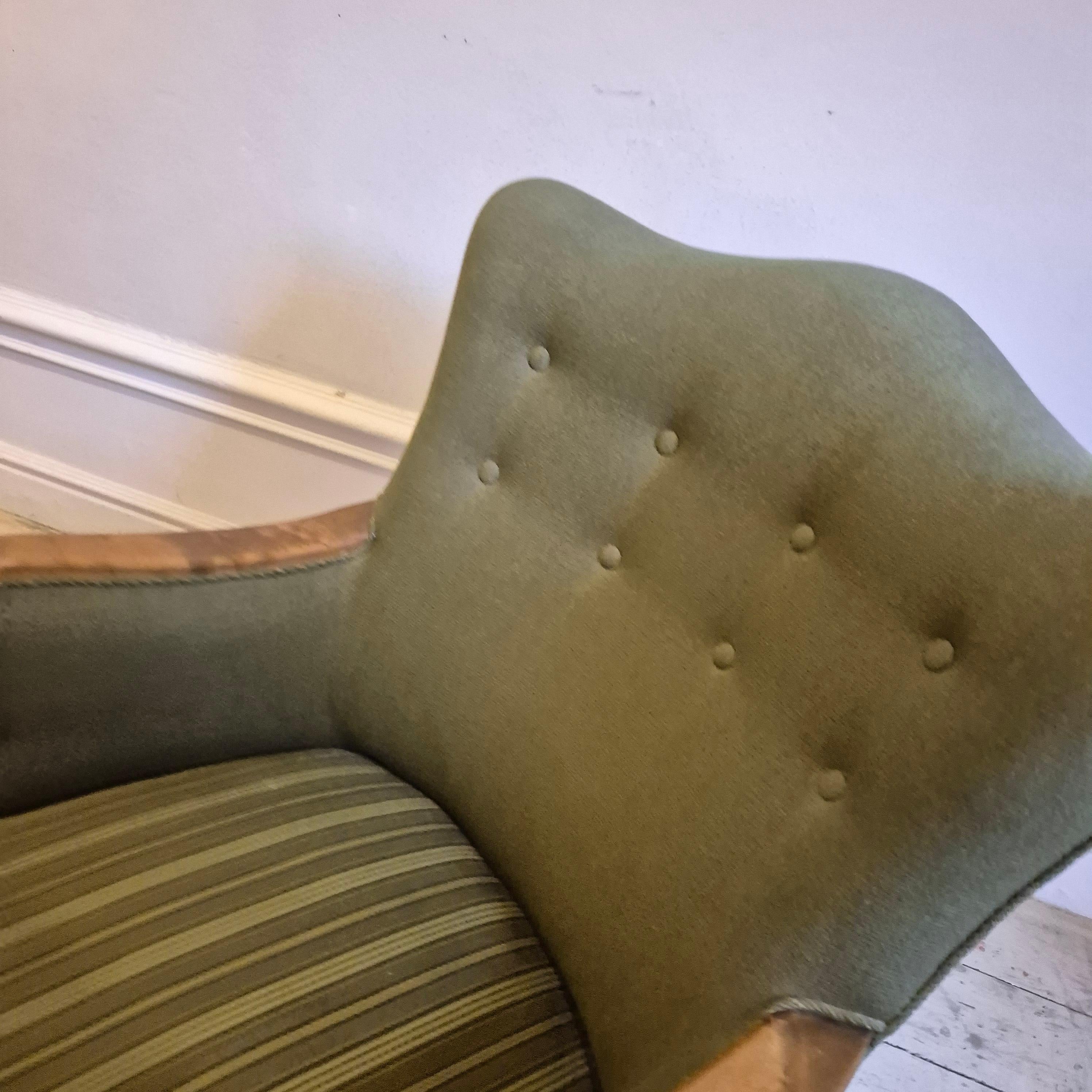 Mid-20th Century Danish Modern armchairs by Alfred Christensen. Beautiful shape, brass feet. For Sale
