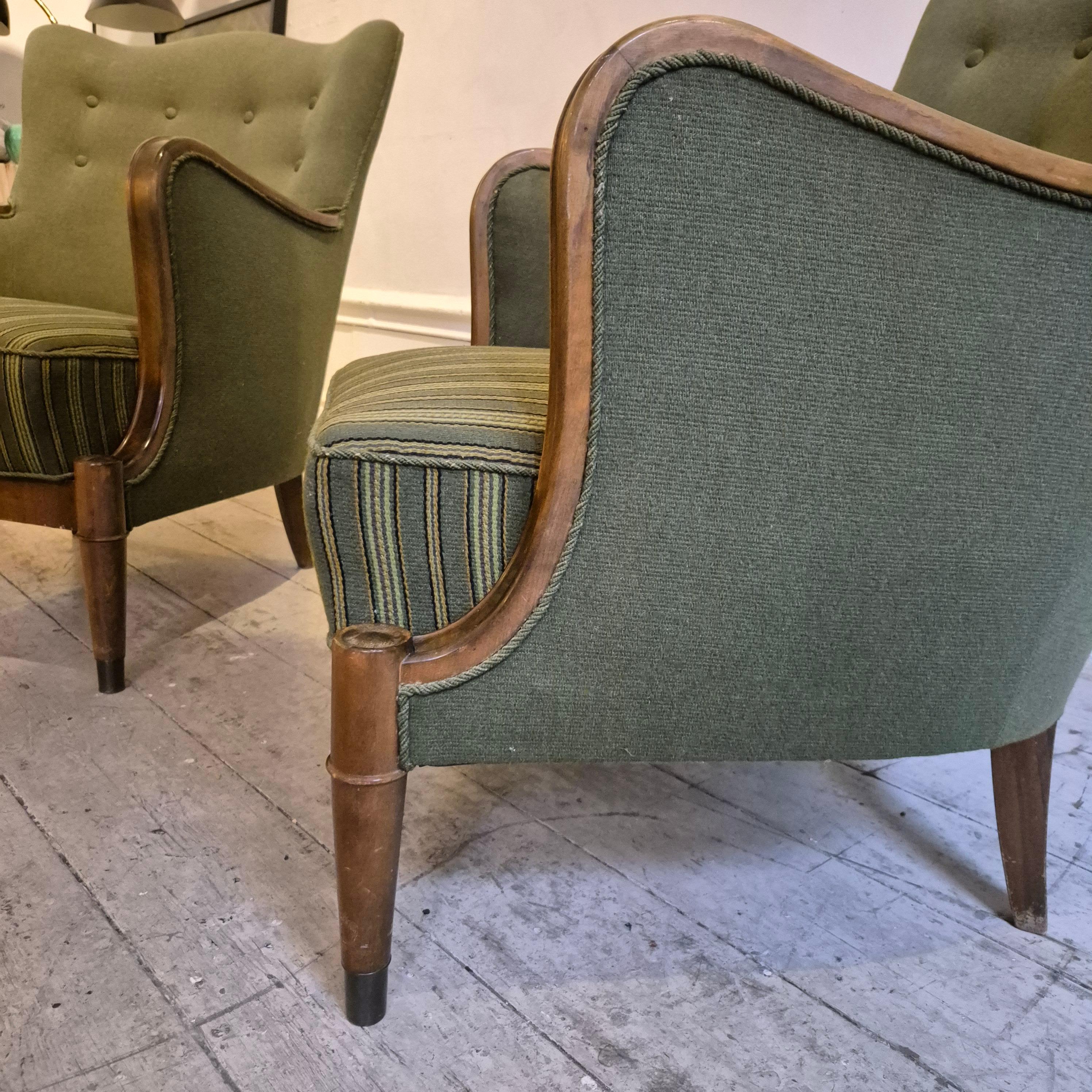 Wool Danish Modern armchairs by Alfred Christensen. Beautiful shape, brass feet. For Sale
