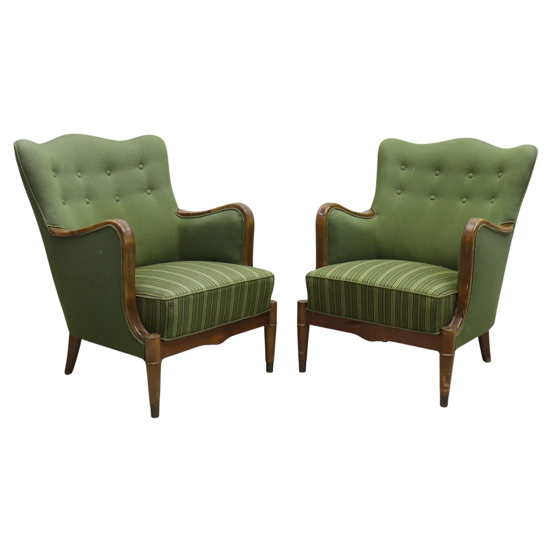 Danish Modern armchairs by Alfred Christensen. Beautiful shape, brass feet. For Sale