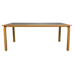 Mesa de comedor danesa moderna de madera curvada de Rud Thygesen y Johnny Sorensen