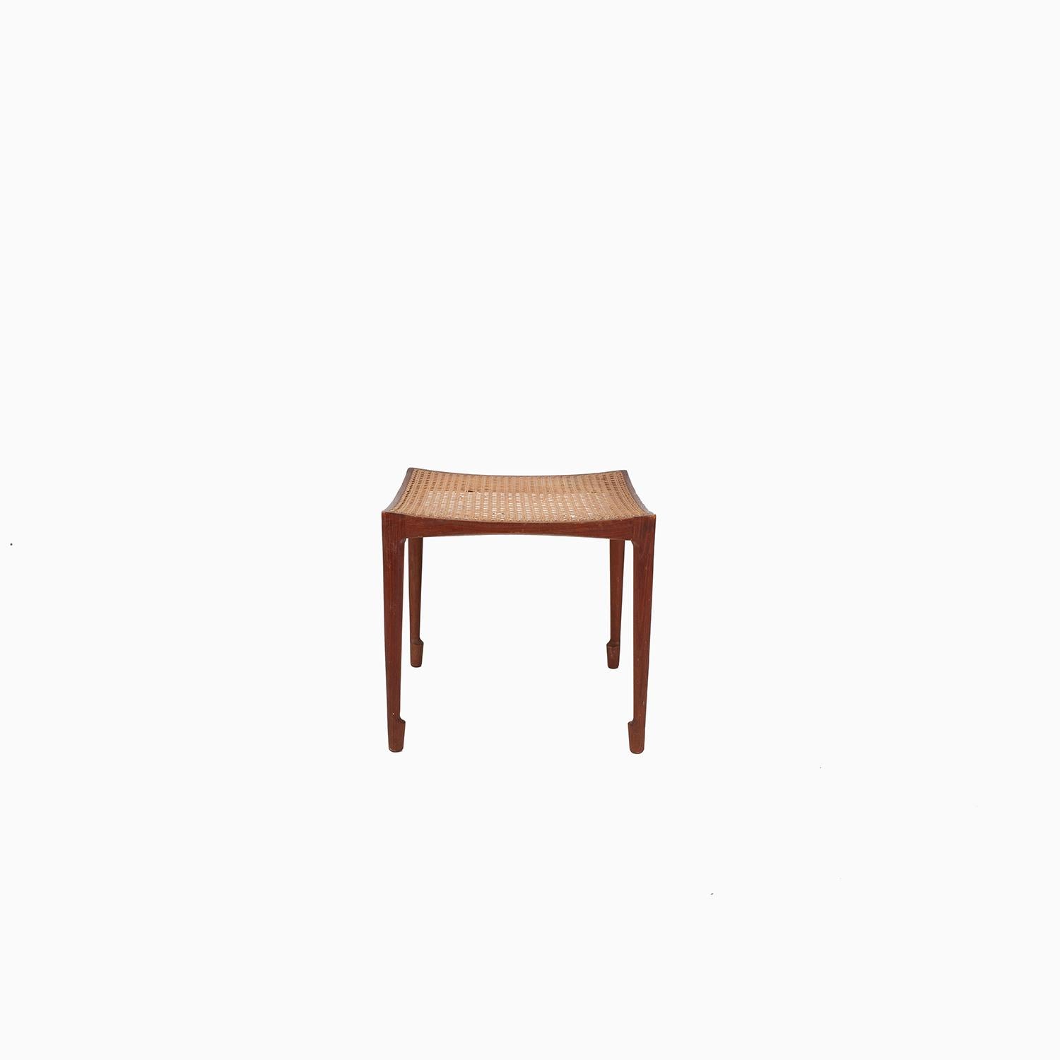 An elegantly designed teak and cane stool by Bernt Petersen for Worts Mobler. Some loss to the caning.

Professional, skilled furniture restoration is an integral part of what we do every day. Our goal 
is to provide beautiful, functional furniture