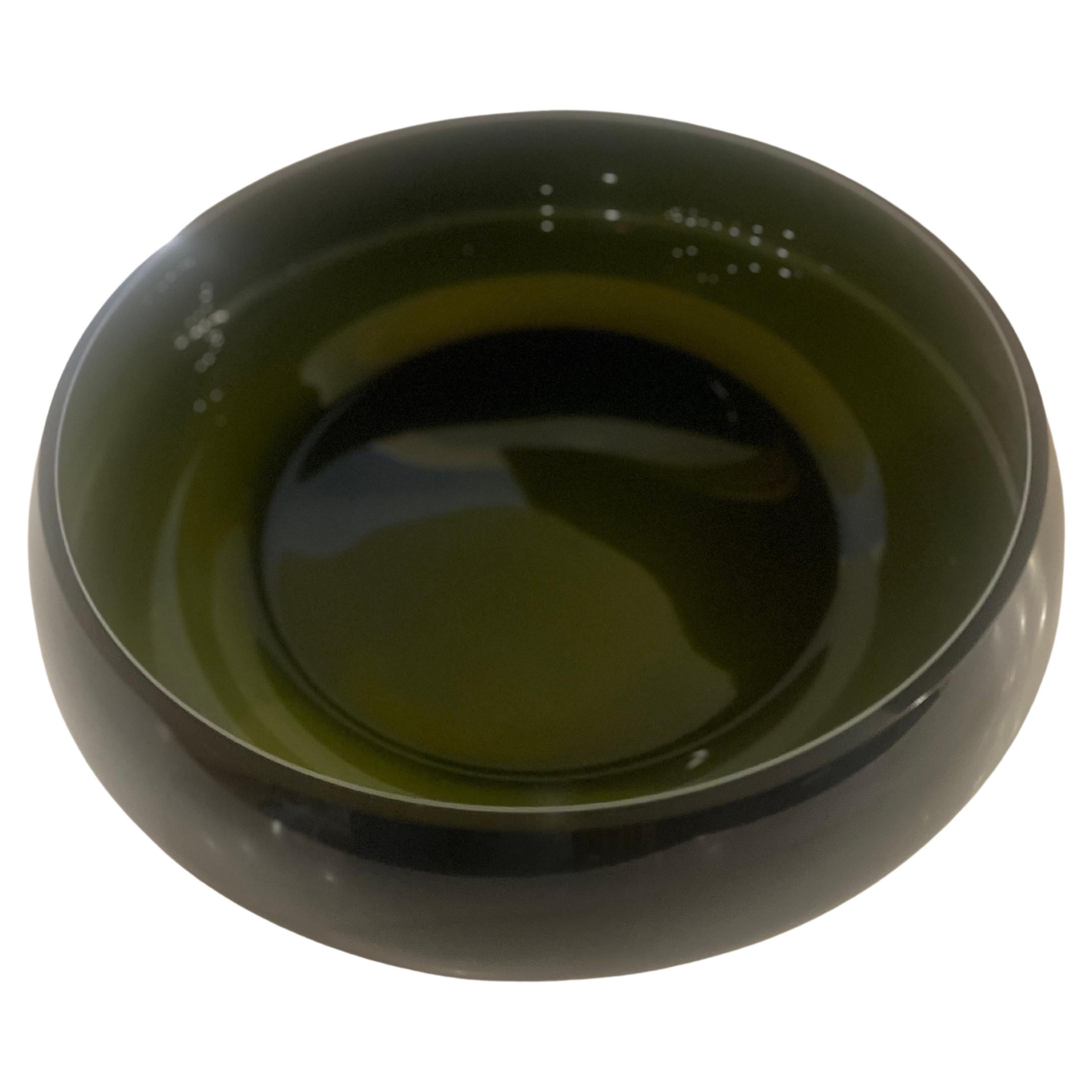 black glass outside with encased green glass insert 
bowl, excellent condition no chips or cracks nice and heavy, circa the 1970s. great for Danish modern ,mid century Scandinavian glass

