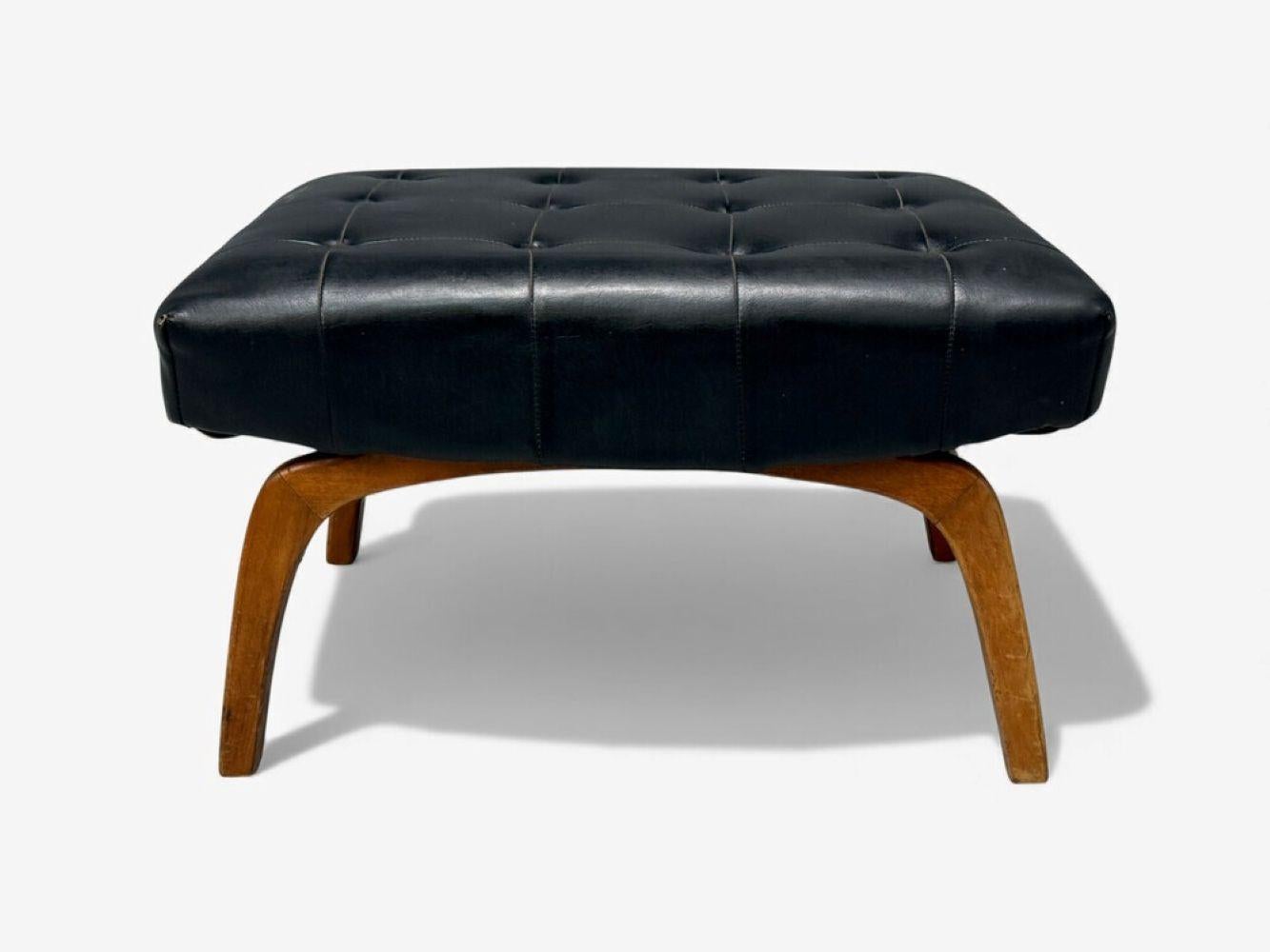 Danish Modern, Black Leatherette, Stained Wood, Ottoman or Footstool, Denmark, 1950s

A black tufted leatherette and stained wood ottoman or footstools designed and produced in Denmark in the middle of the 20th century.

Leatherette, Wood; Denmark