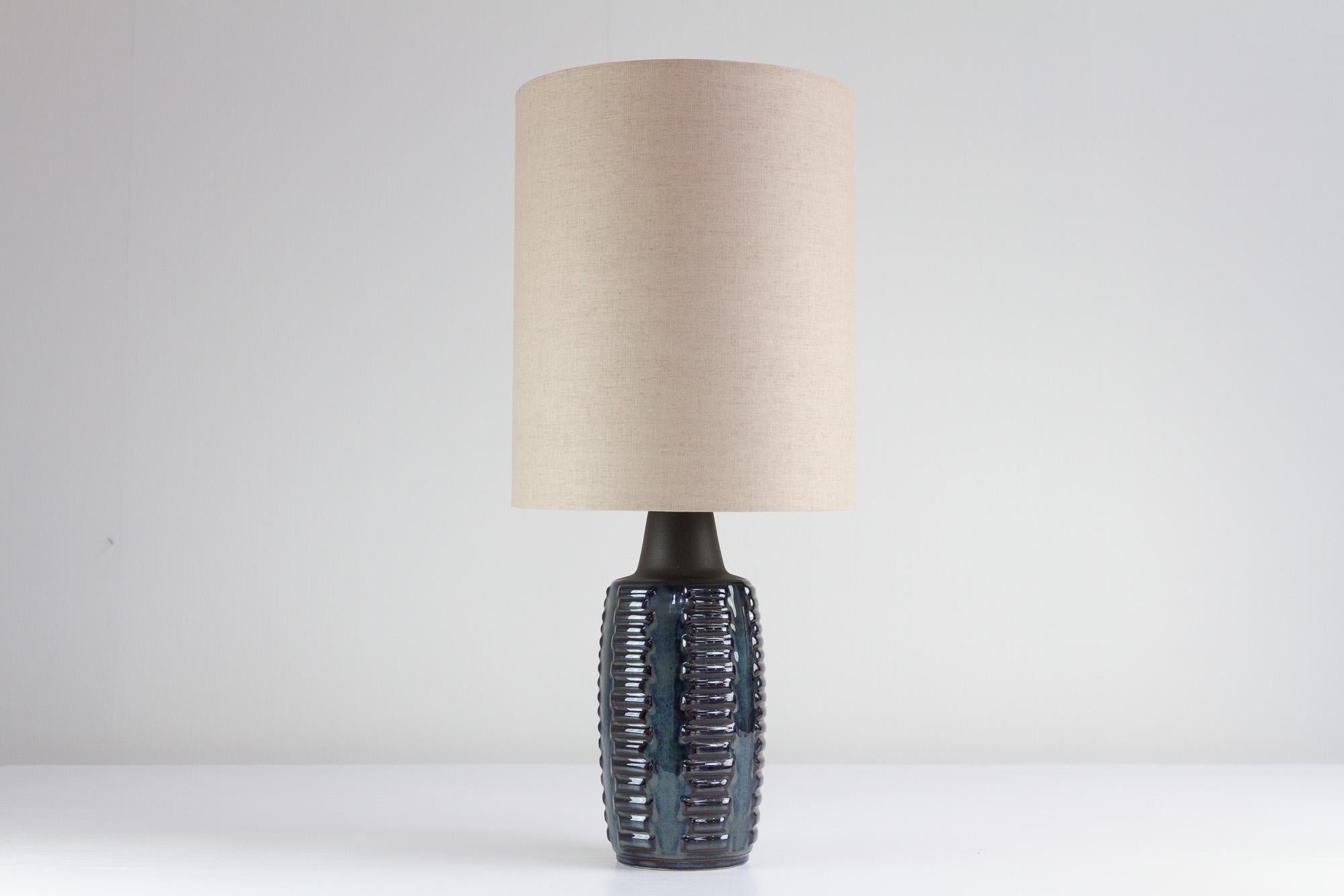 Danish modern ceramic table lamp by Einar Johansen for Søholm, 1960s.
Mid-Century Modern Danish blue ceramic table lamp designed by Einar Johansen, made by Søholm, Denmark. Soholm is a Danish pottery on the island of Bornholm founded in 1835.