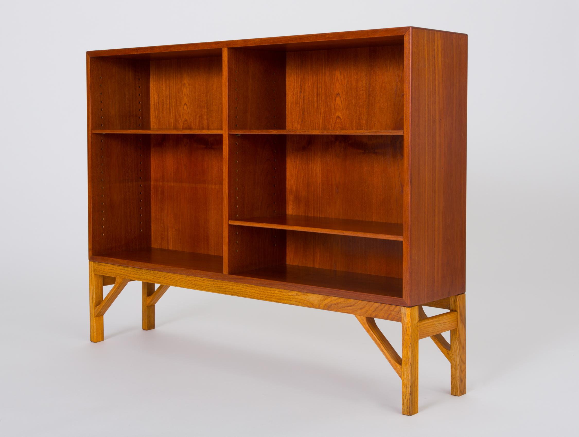 A modest yet exceptionally functional bookcase designed in the 1940s by Børge Mogensen for FDB Møbler and produced in cooperation with C.M. Madsens, a cabinetmaker based in Haarby, Denmark. The case and adjustable shelves are bright teak wood, and