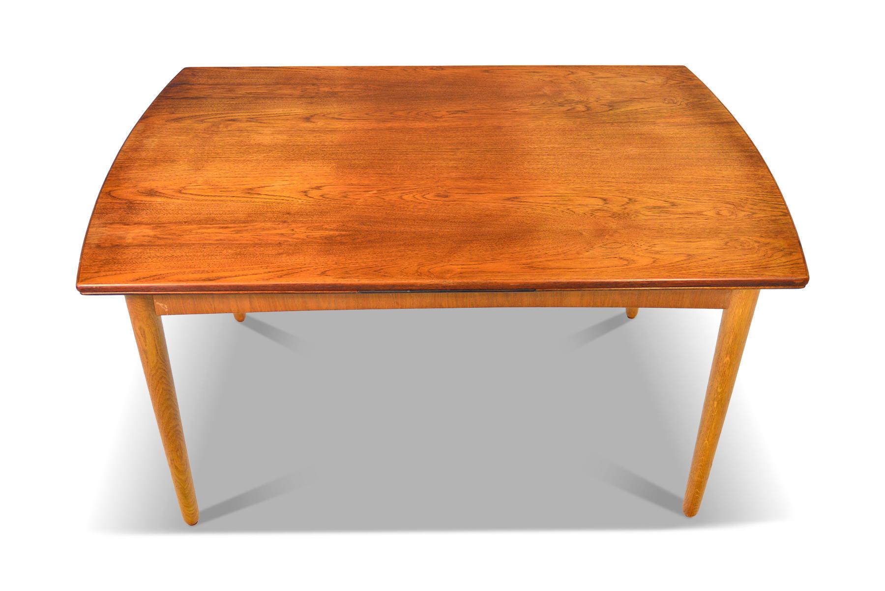 Origin: Denmark
Designer: Unknown
Manufacturer: Unknown
Era: 1960s
Materials: Teak, oak
Measurements: 53 long x 35.5 wide x 29.5 tall
Expanded (both leaves): 91 long x 35.5 wide x 29.5 tall

Condition: In good original condition with some