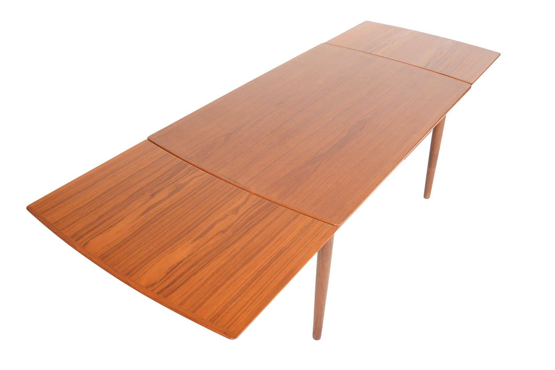 20th Century Danish Modern Bow Edge Teak Draw Leaf Dining Table