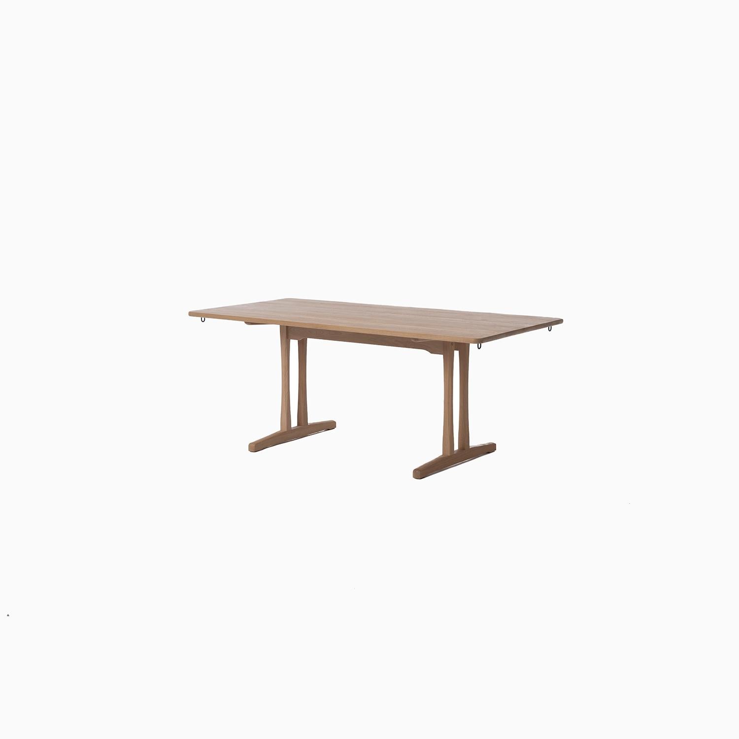 Solid oak dining table with two leaves designed by Børge Mogensen for Fredericia. A newer production with coated black extension leaves.


Professional, skilled furniture restoration is an integral part of what we do every day. Our goal 
is to