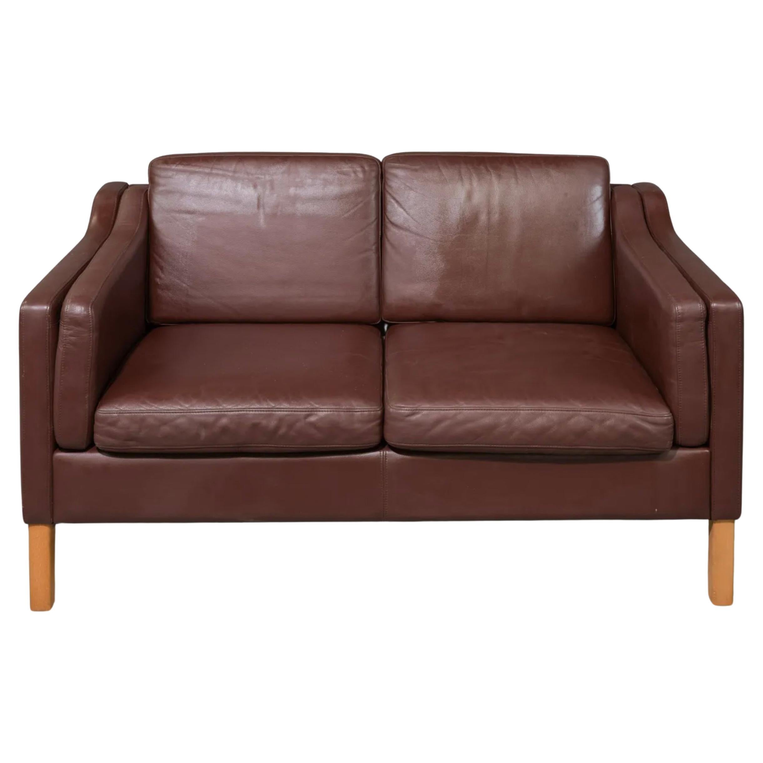 Danish modern brown leather 2 seat sofa with birch legs style of Børge Mogensen For Sale