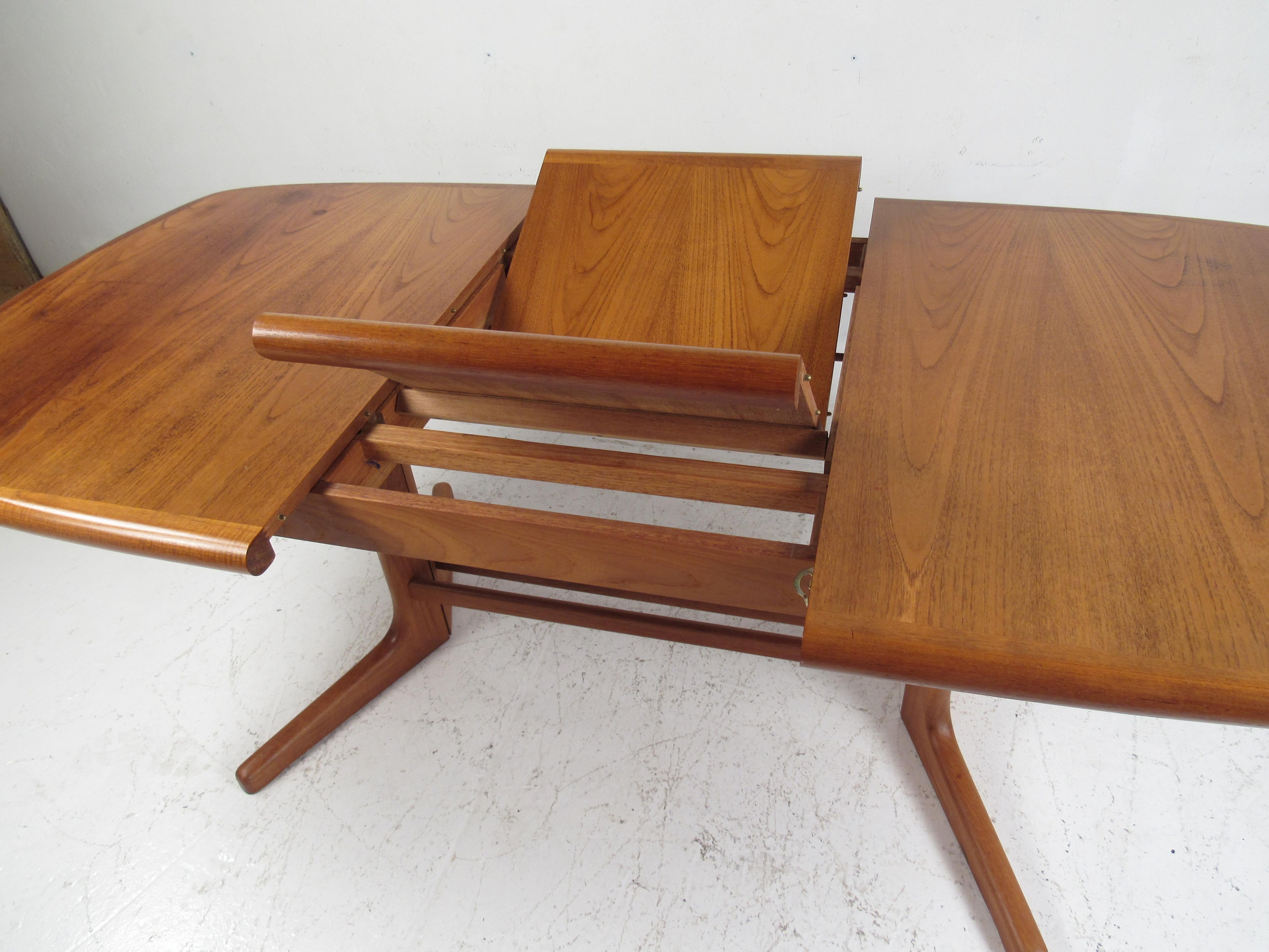 mid century modern dining table with butterfly leaf