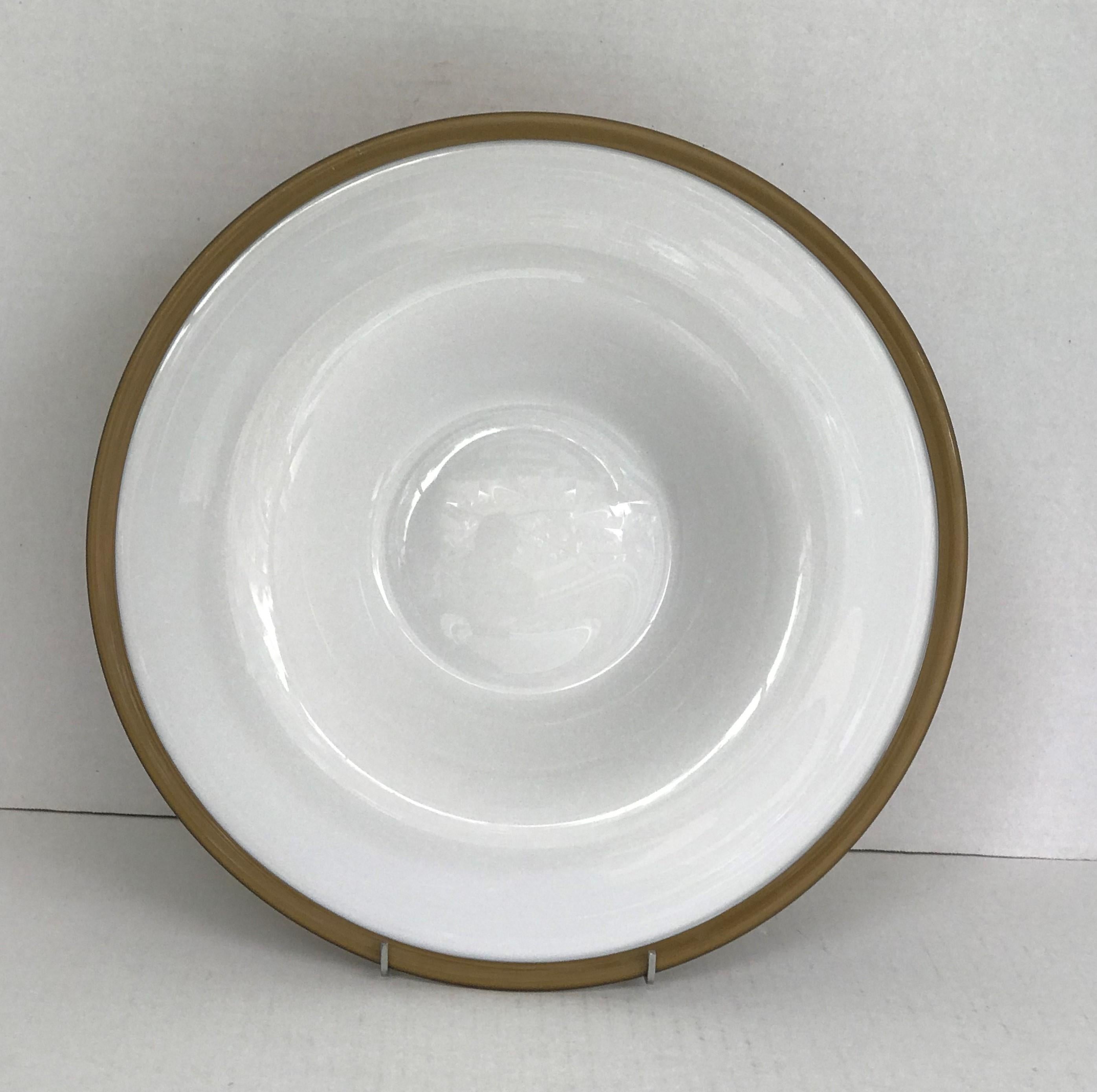 Scandinavian Mid-Century Modern center piece or large platter in cased glass with inside white center and golden bronze color outside and rim. Beautifully executed in the 1960s by Danish manufacturer Odense Glass Factory (later Holmegaard) from a