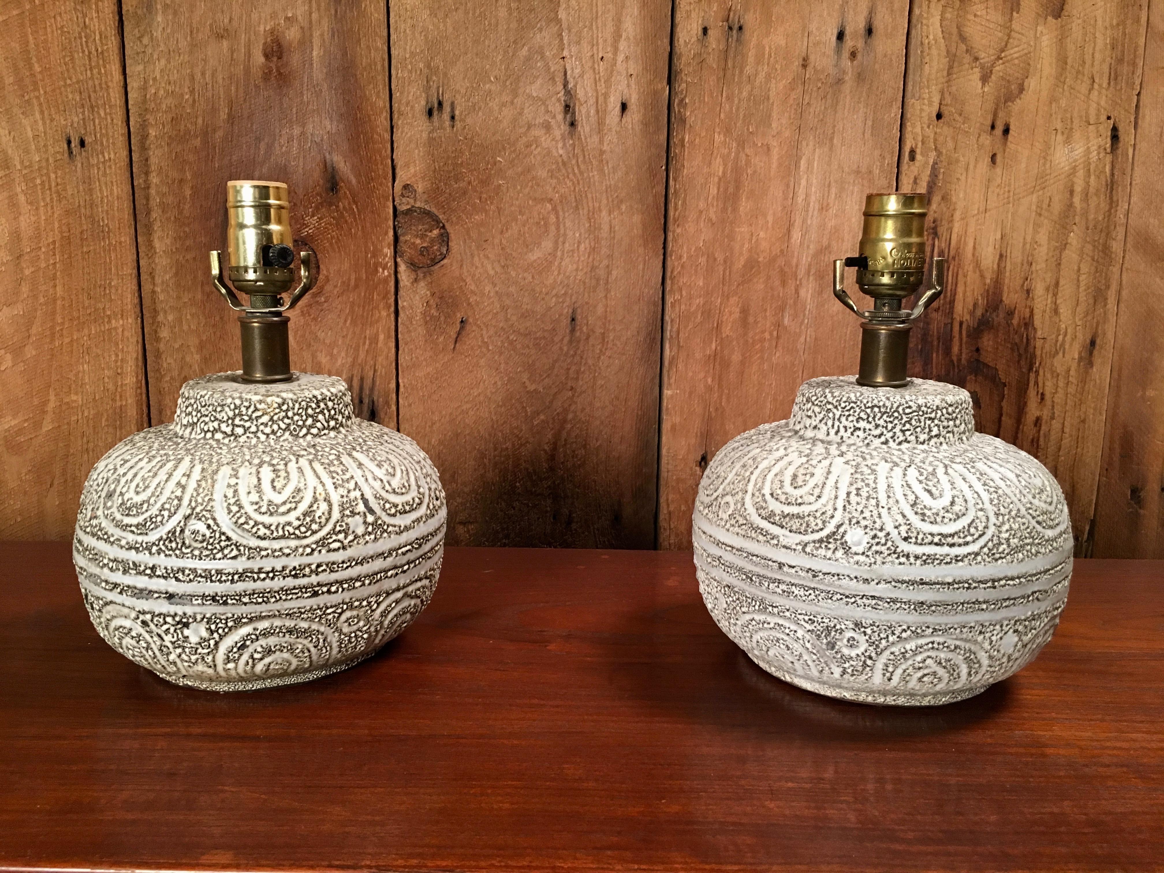 Pair of Danish sculpted glazed pottery lamps in grey and oatmeal color (Shades not included).