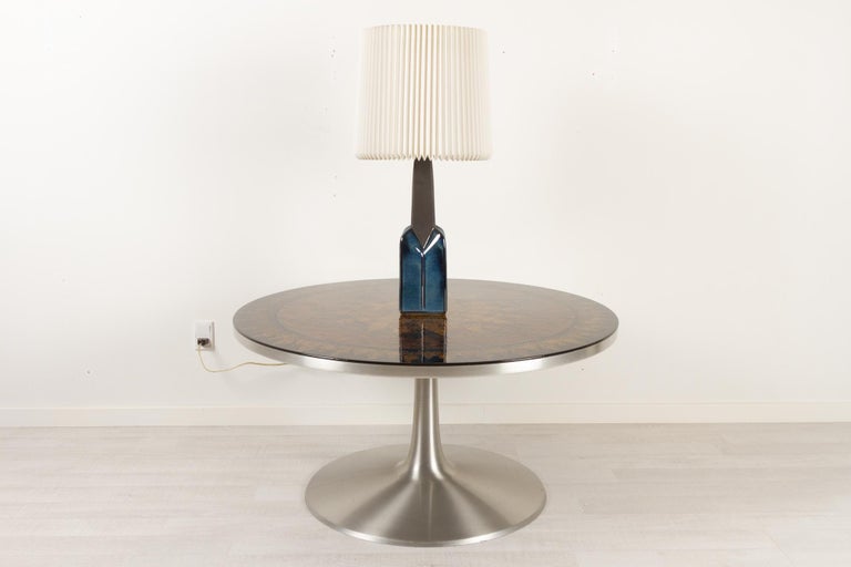 Danish Modern tall ceramic table lamp by Einar Johansen for Søholm 1960s.
This stunning table lamp is made of stoneware with a ceramic glaze in dark blue. It comes with a white hand-pleated lampshade from Le Klint. 
Model 1029.
E26/27