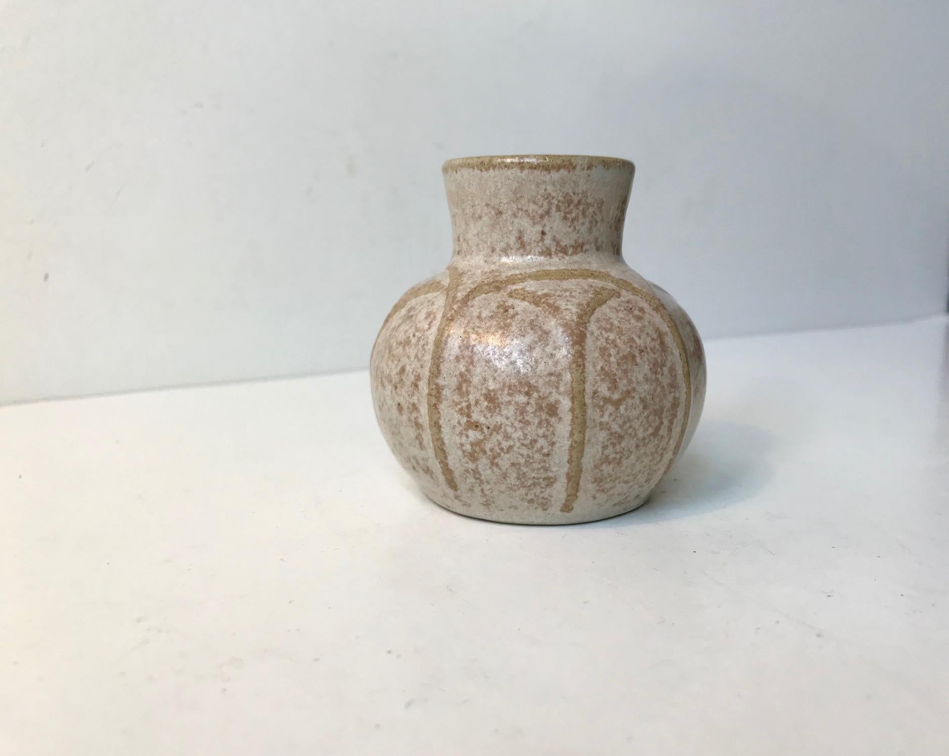 - Among the most desirable pieces from L. Hjorth Ceramic in Denmark
- This small vase has delicate, soft and speckled glaze
- Bears resemblance to similar designs from Arne Bang and Eva Stahr Nielsen who also strived towards a visual glaze effect