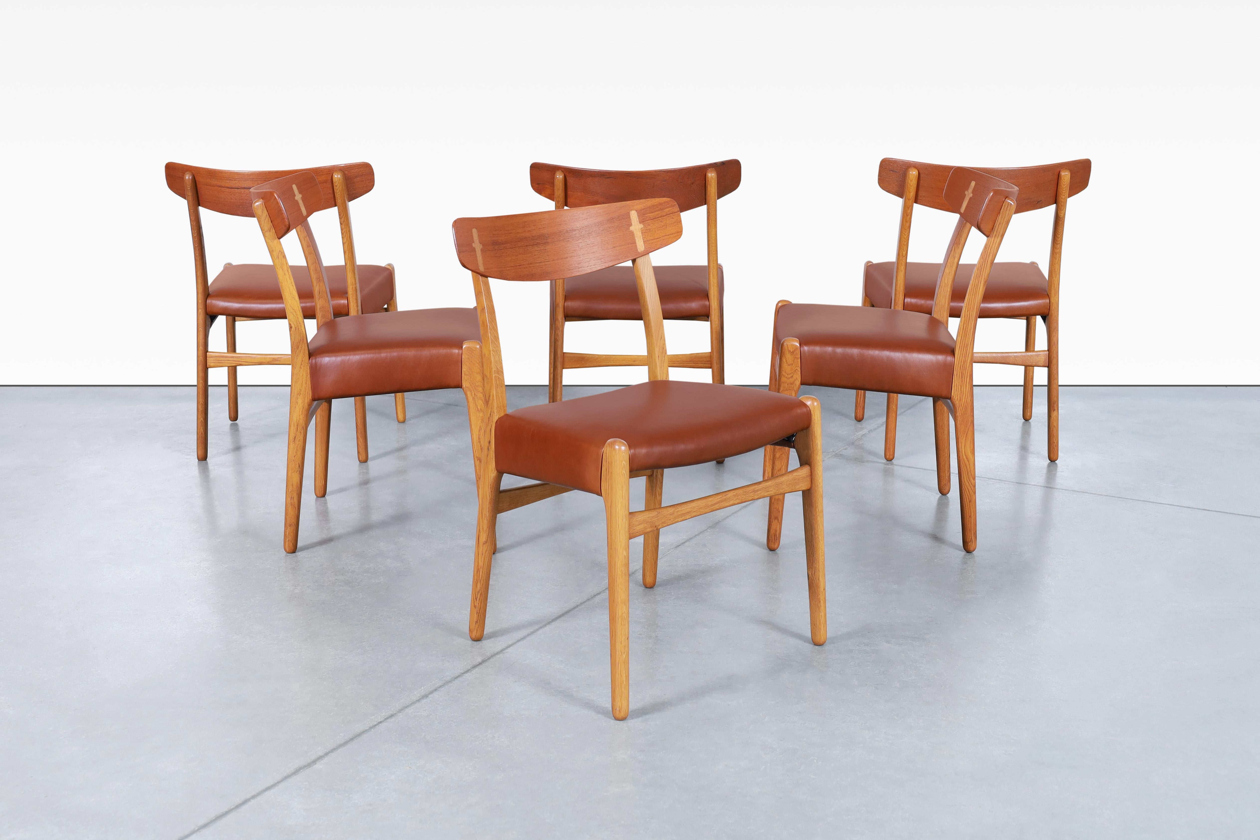 Danish Modern CH-23 Leather Dining Chairs by Hans J. Wegner In Excellent Condition For Sale In North Hollywood, CA