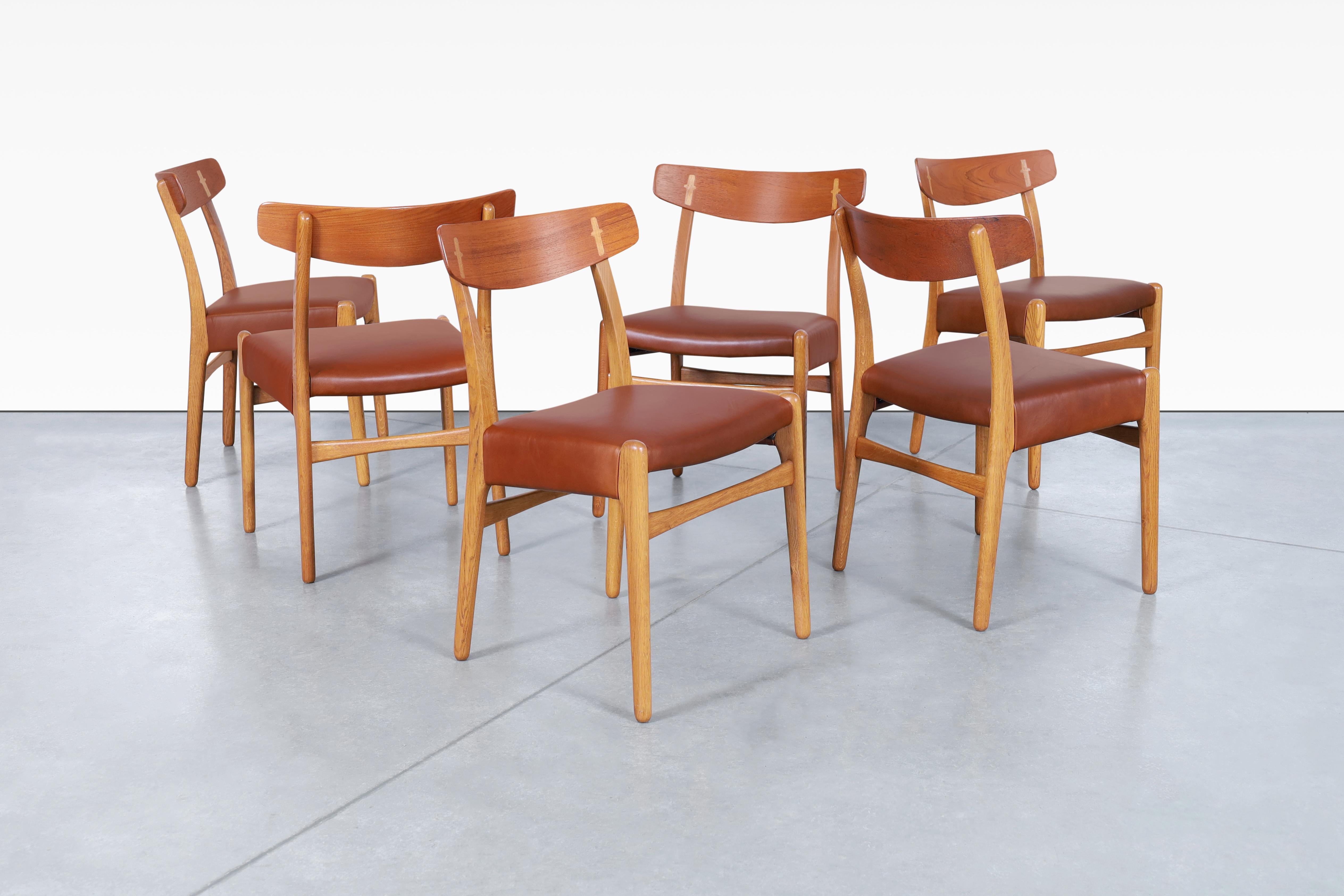 Mid-20th Century Danish Modern CH-23 Leather Dining Chairs by Hans J. Wegner For Sale