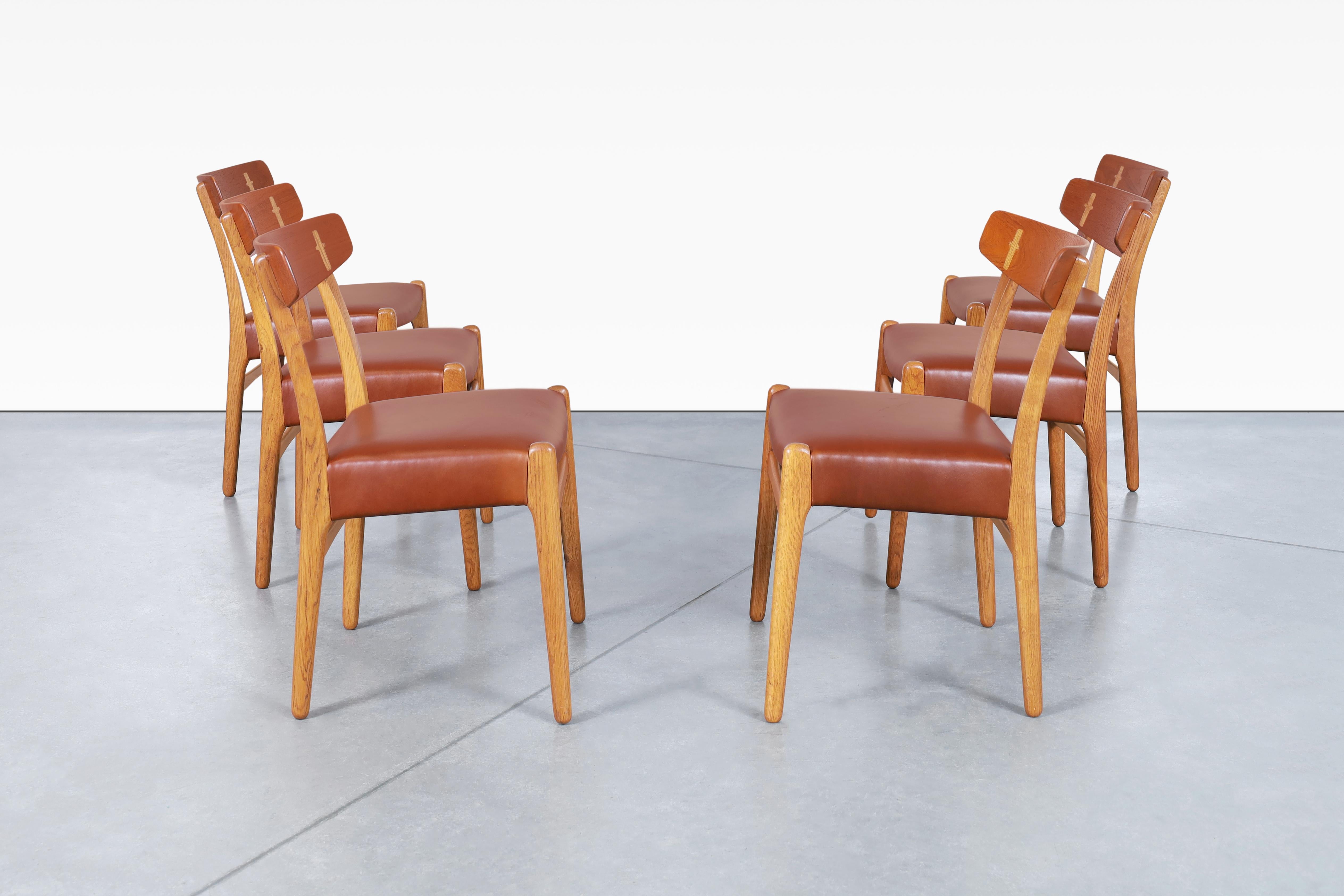 Danish Modern CH-23 Leather Dining Chairs by Hans J. Wegner For Sale 1