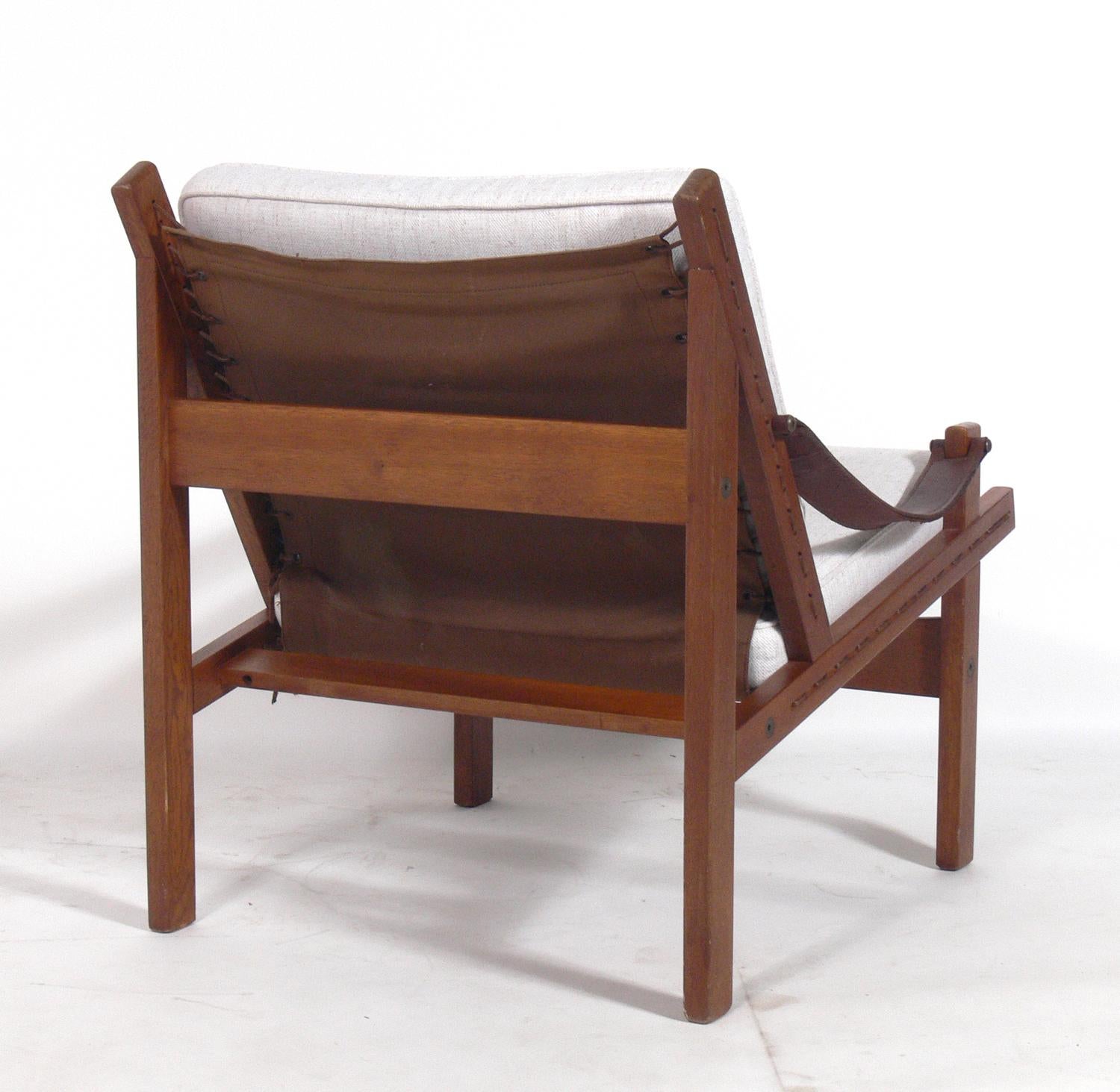 leather strap arm chair