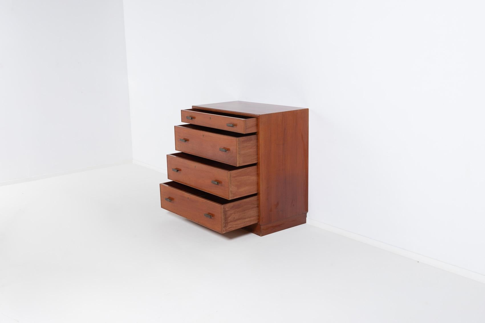 Beautiful chest of drawers in varnished mahogany produced by Rud. Rasmussens. Exceptional Scandinavian craftsmanship.

Condition
Good, age related wear and marks

Dimensions
height: 89 cm
width: 83 cm
depth: 48 cm