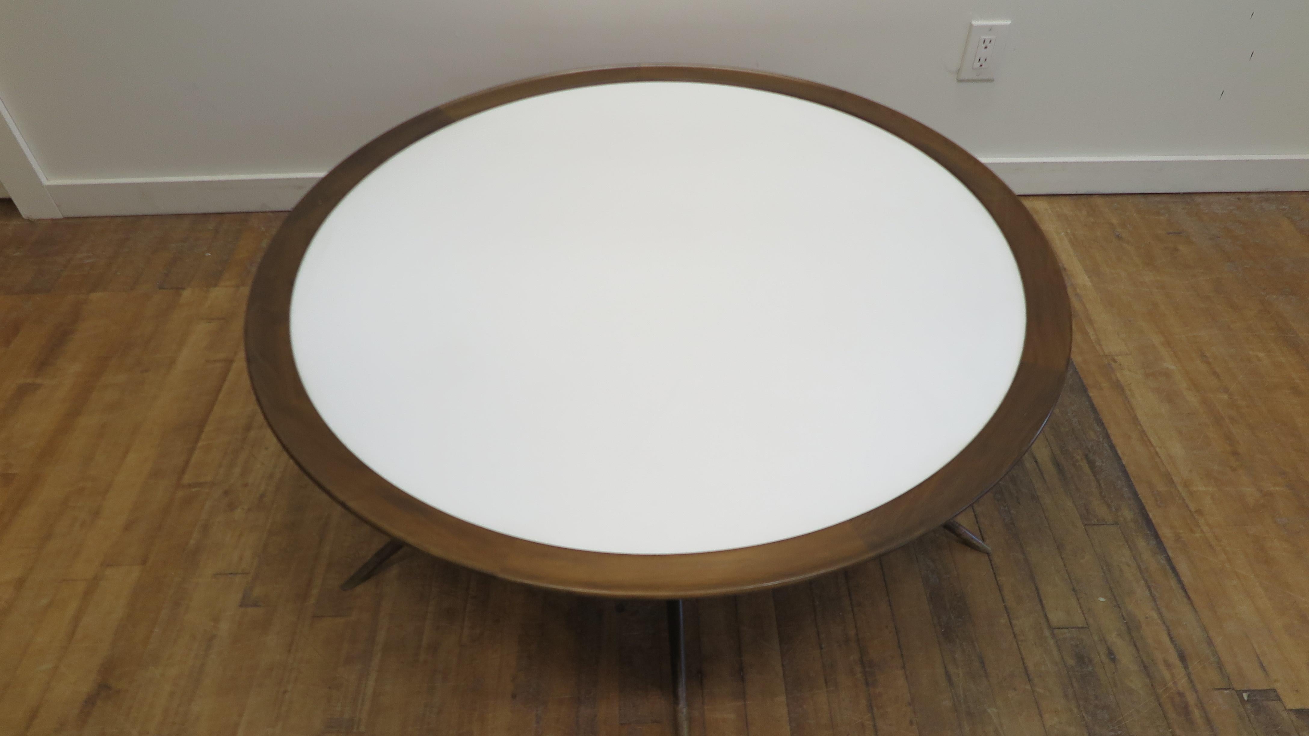 Poul Jensen Danish Modern Coffee Table.  A spectacular Danish Modern coffee table by Poul Jensen for Selig having original Vitrolite white glass top with splayed legs (spider legs) capped with brass sabot feet.  Very special to have an all original