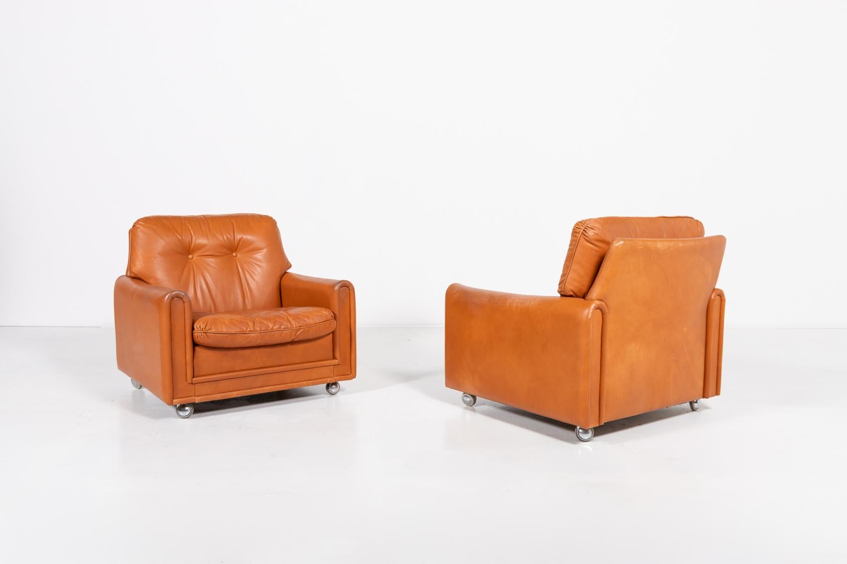 Mid-20th Century Danish Modern cognac leather armchairs from 1960’s For Sale