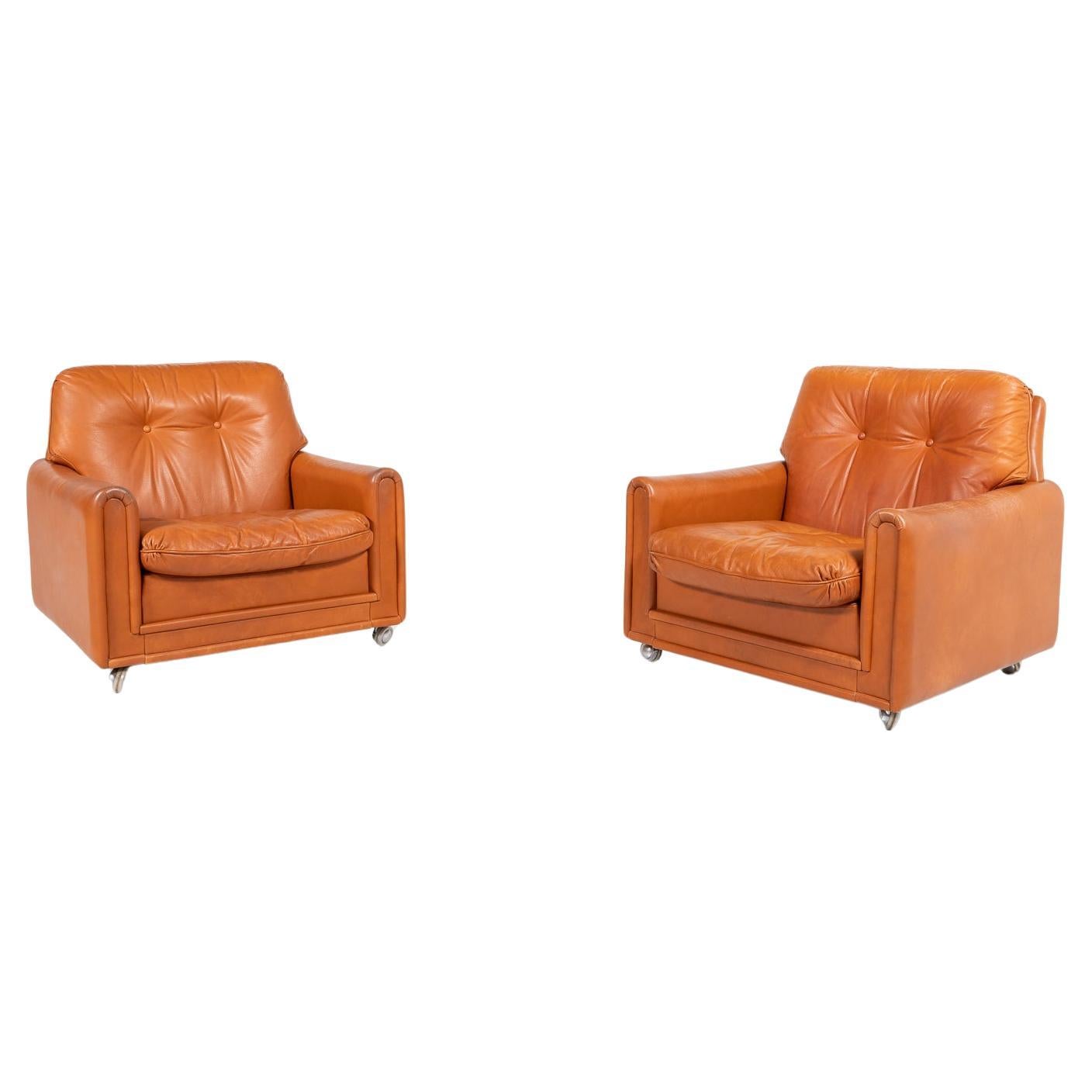 Danish Modern cognac leather armchairs from 1960’s For Sale