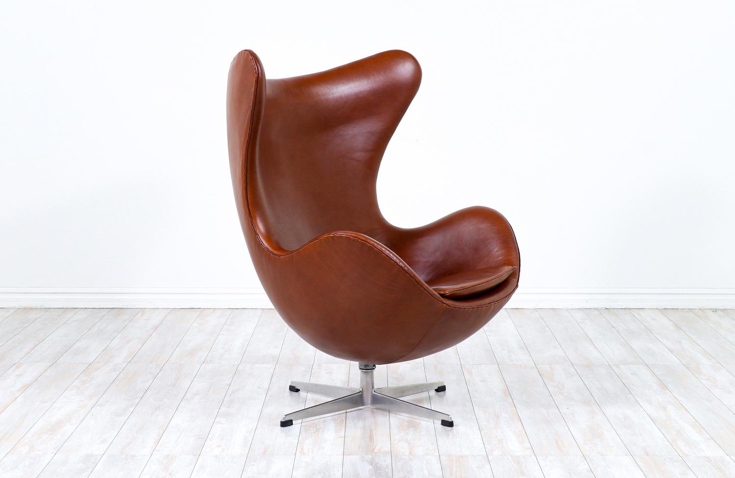 Initially designed for the SAS Royal Hotel in Copenhagen in 1958, the Egg chair has become one of the most acclaimed models of Danish furniture designer, Arne Jacobsen. This iconic design is comprised of a fiberglass shell that is reupholstered in a