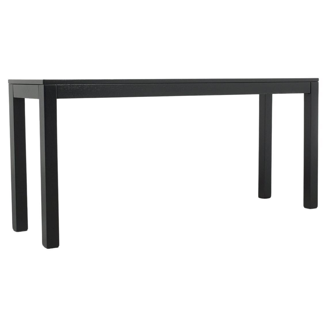 Dive into the world of 1970s Danish modern design with our exquisitely restored console table. Crafted with precision from premium teak wood, this piece is a true testament to timeless Scandinavian craftsmanship. It boasts a refined ebonized hue,