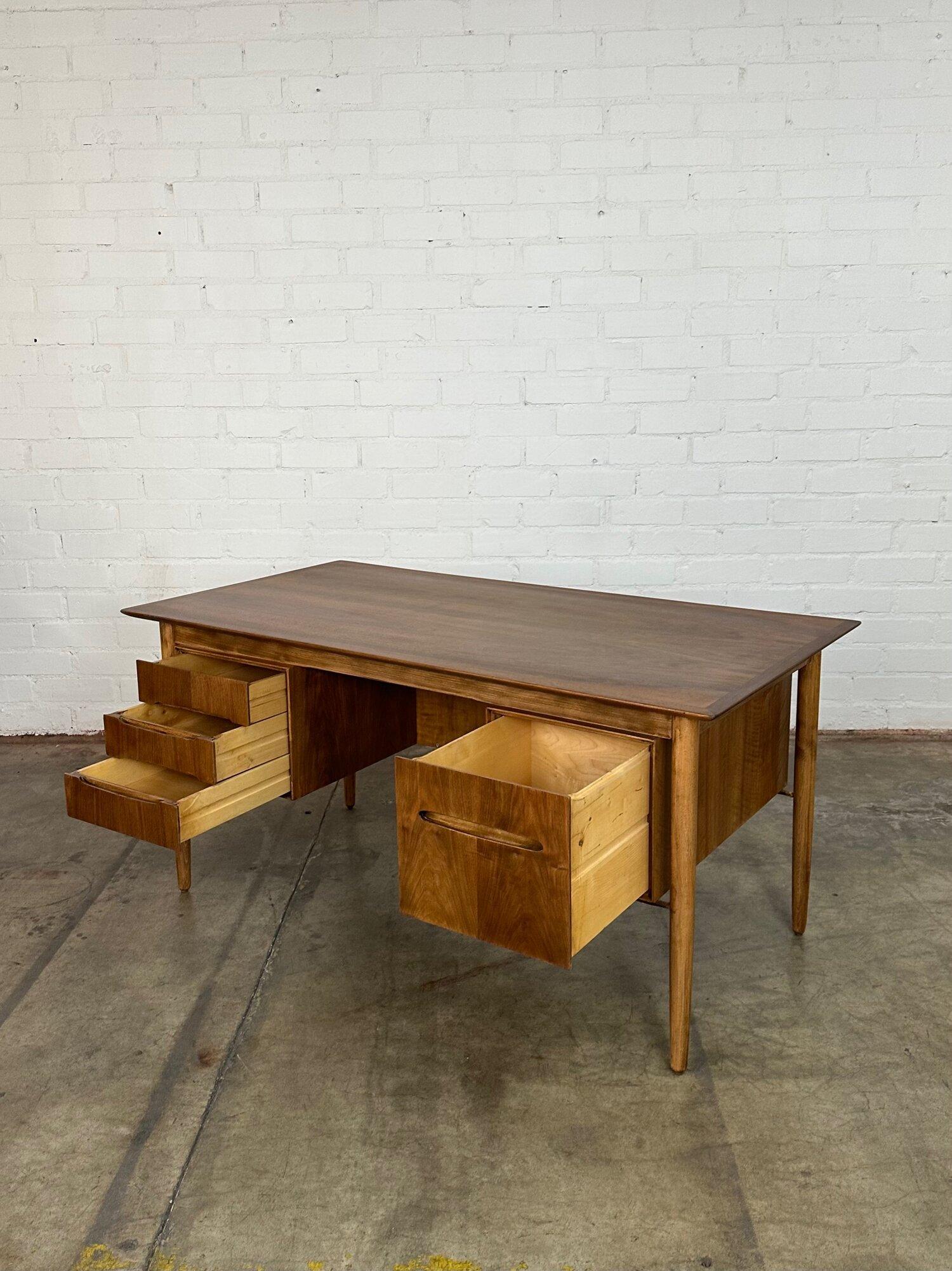 W59 D32 H29 KC26

Fully restored desk in a clear coat showcasing natural wood hues and natural grain. Desk is structurally sound and fully functional. Shows no major areas of wear.