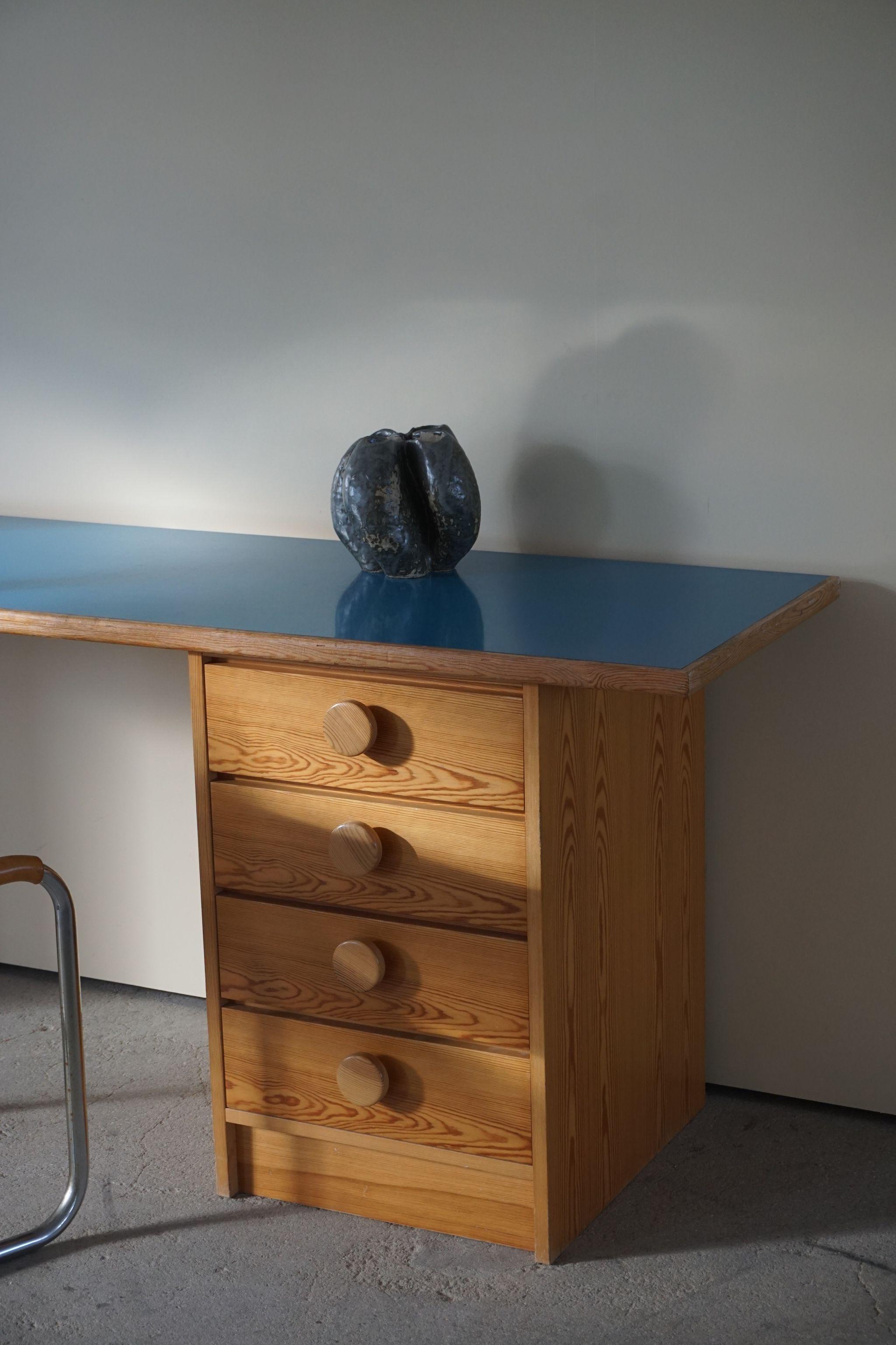 Danish modern desk in pine and blue Formica, 1970s. 
The desk can also be used as a freestanding desk.
