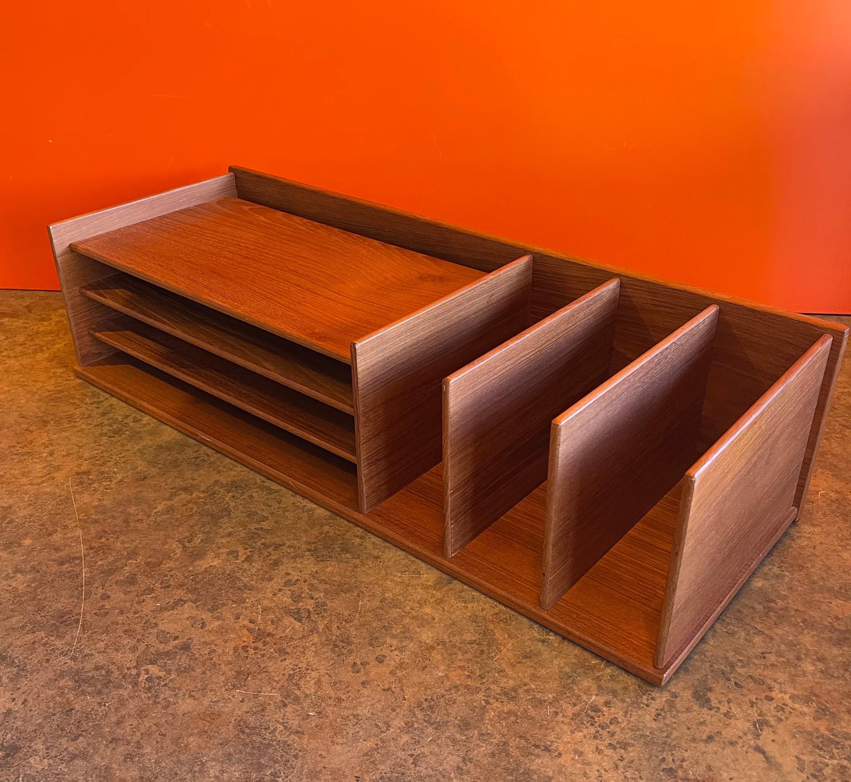 Very functional Danish modern teak desk organizer or letter tray by Georg Petersens Møbelfabrik, circa 1970s. The piece is in excellent condition and measures 23.5