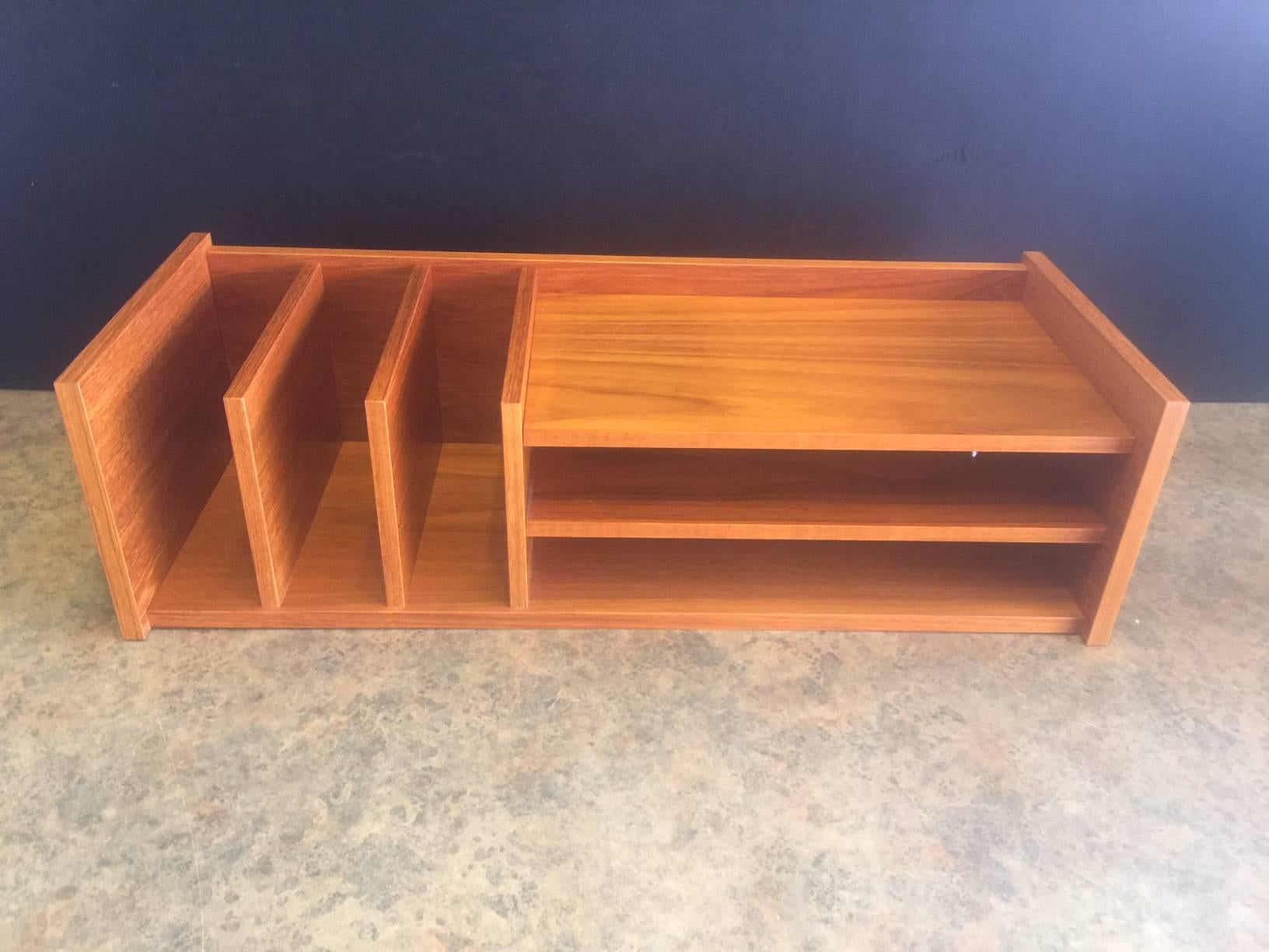 Very functional Danish modern teak desk organizer or letter tray. The piece is in good vintage condition and measures 24