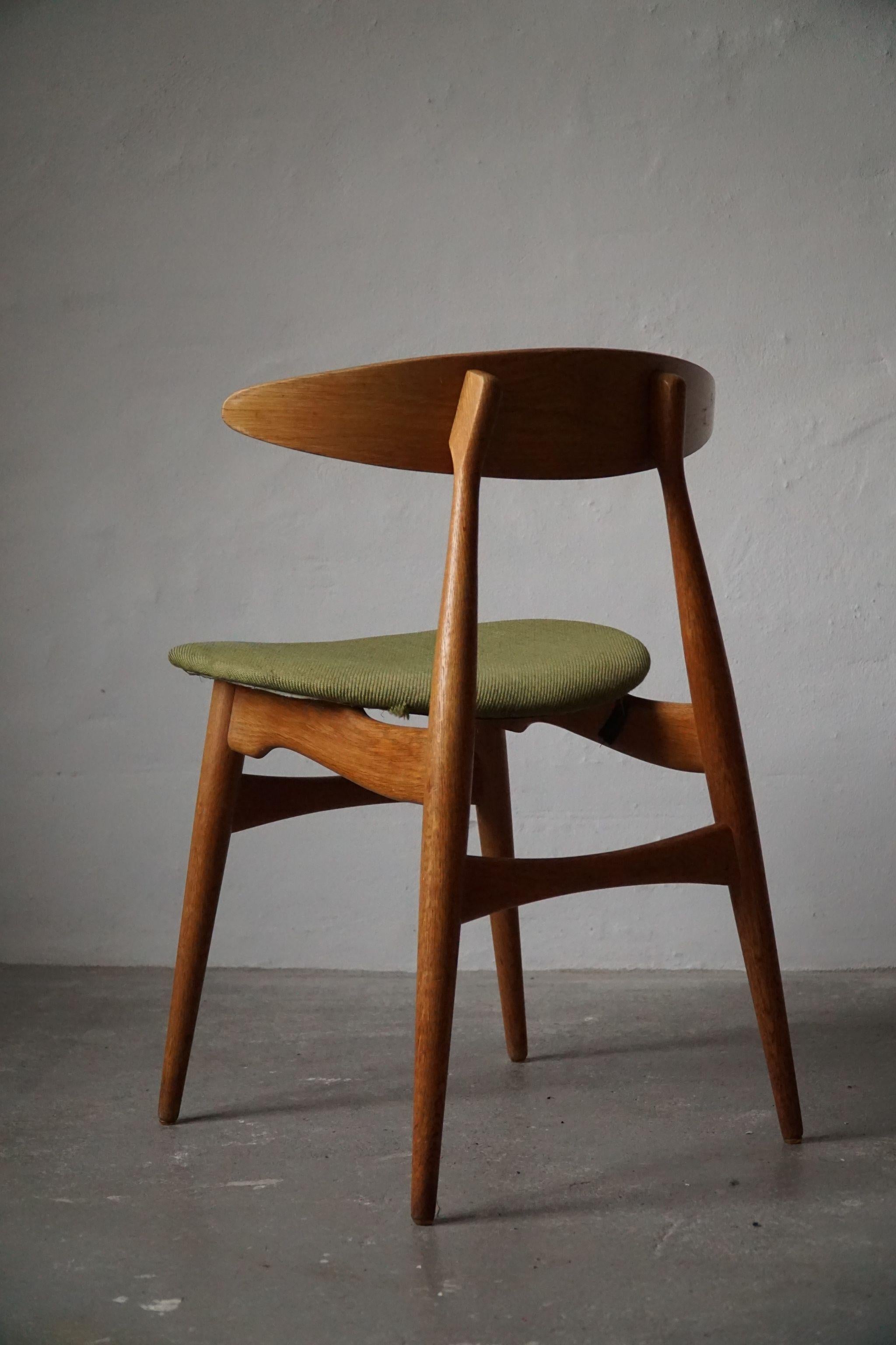 Mid-20th Century Danish Modern Dining Chair in Oak by Hans J. Wegner, Model CH33, 1960s