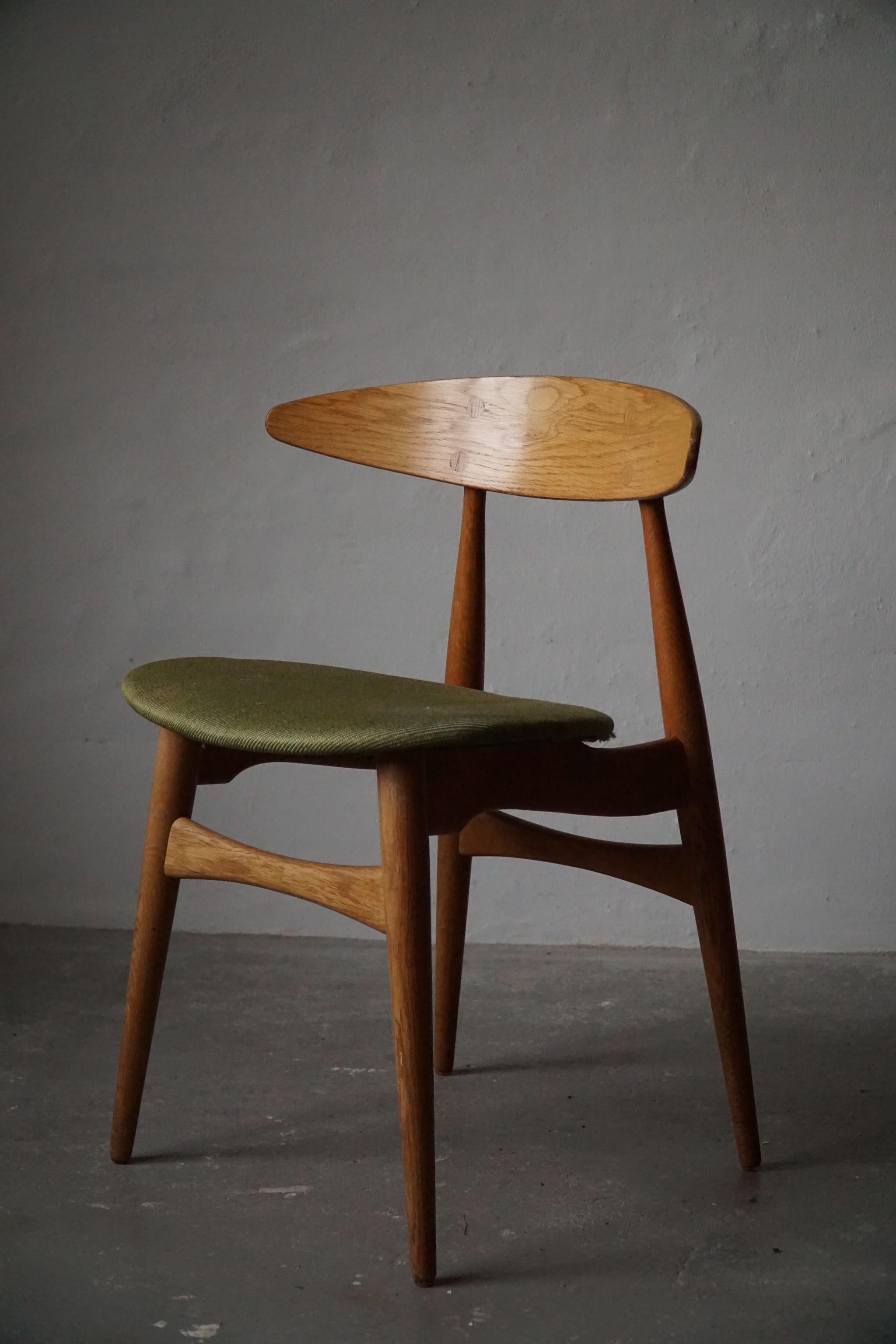 Danish Modern Dining Chair in Oak by Hans J. Wegner, Model CH33, 1960s 1