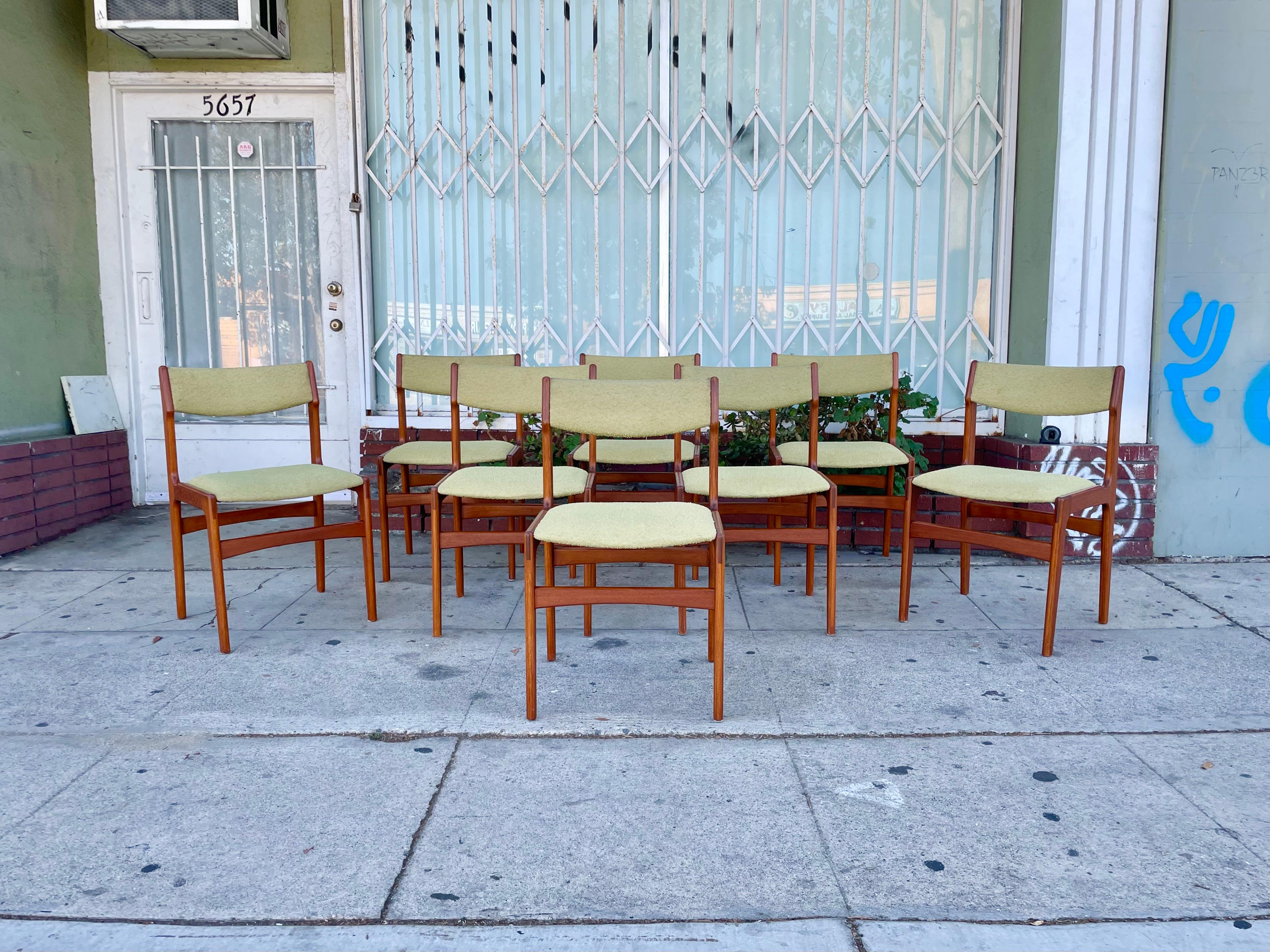 These beautiful Danish Modern teak dining chairs were designed by Erik Buch and manufactured in Denmark circa 1960s. Each chair features a strong solid teak frame that gives an excellent color tone and a beautiful grain pattern creating a refined
