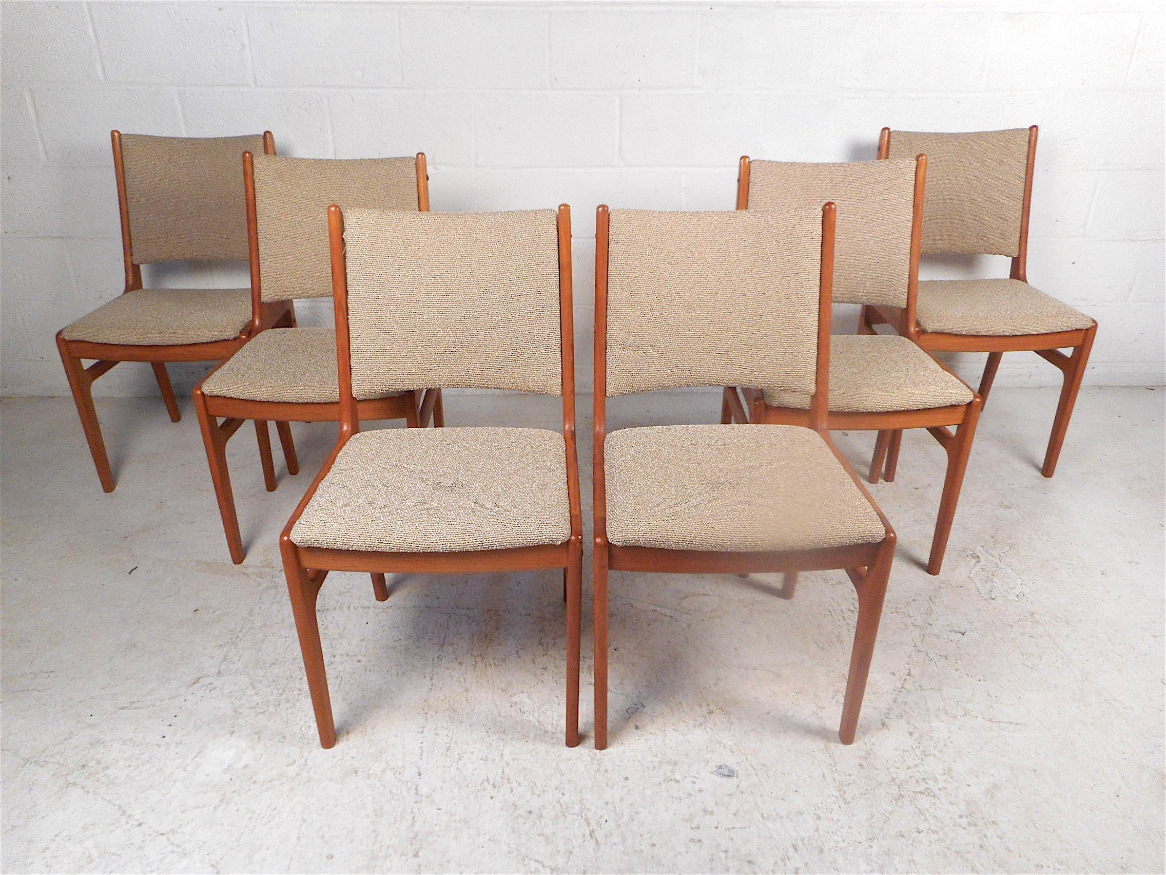 Beautiful set of 6 Danish modern style dining chairs made by D-scan. Teak wood construction with handsome joinery showcased on the frames. Stylish set sure to impress in any modern interior. Please confirm item location with dealer (NJ or NY).