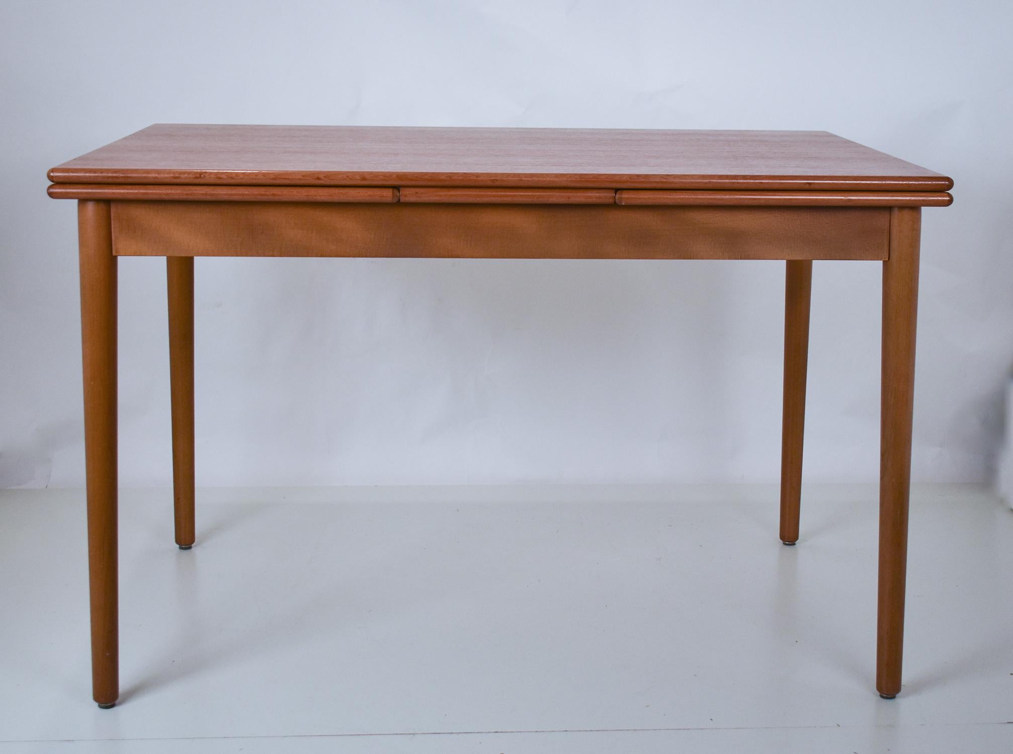 Mid-Century Modern Danish modern draw leaf teak extending dining table  manufactured by AM Møbler  For Sale