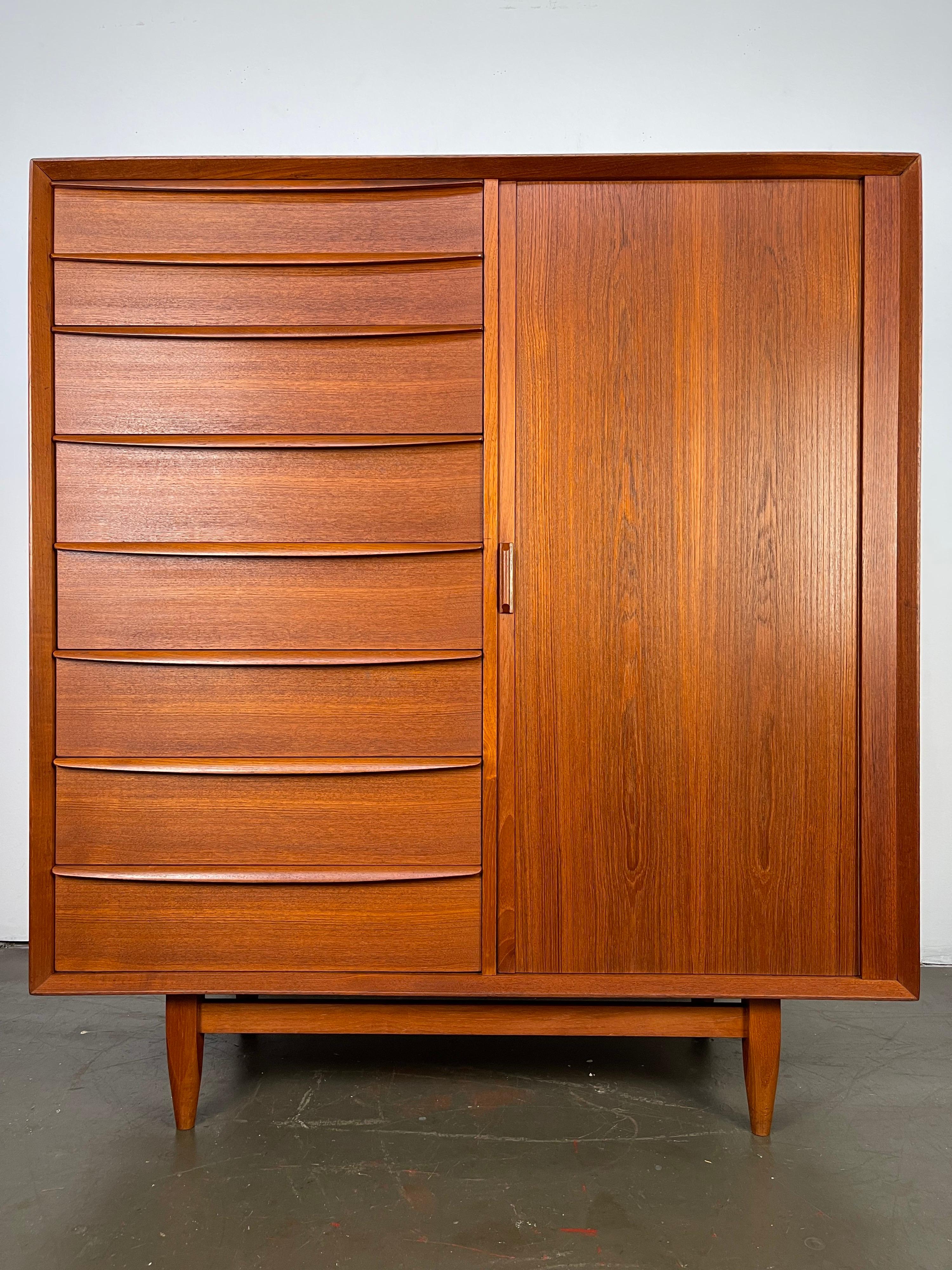Large and very well-made Danish Modern chest of drawers by Arne Wahl Iverson for Falster, in old growth teak. They even made some of the drawer sides with rosewood which, given the rarity and value, is hard to believe. Beautifully designed with
