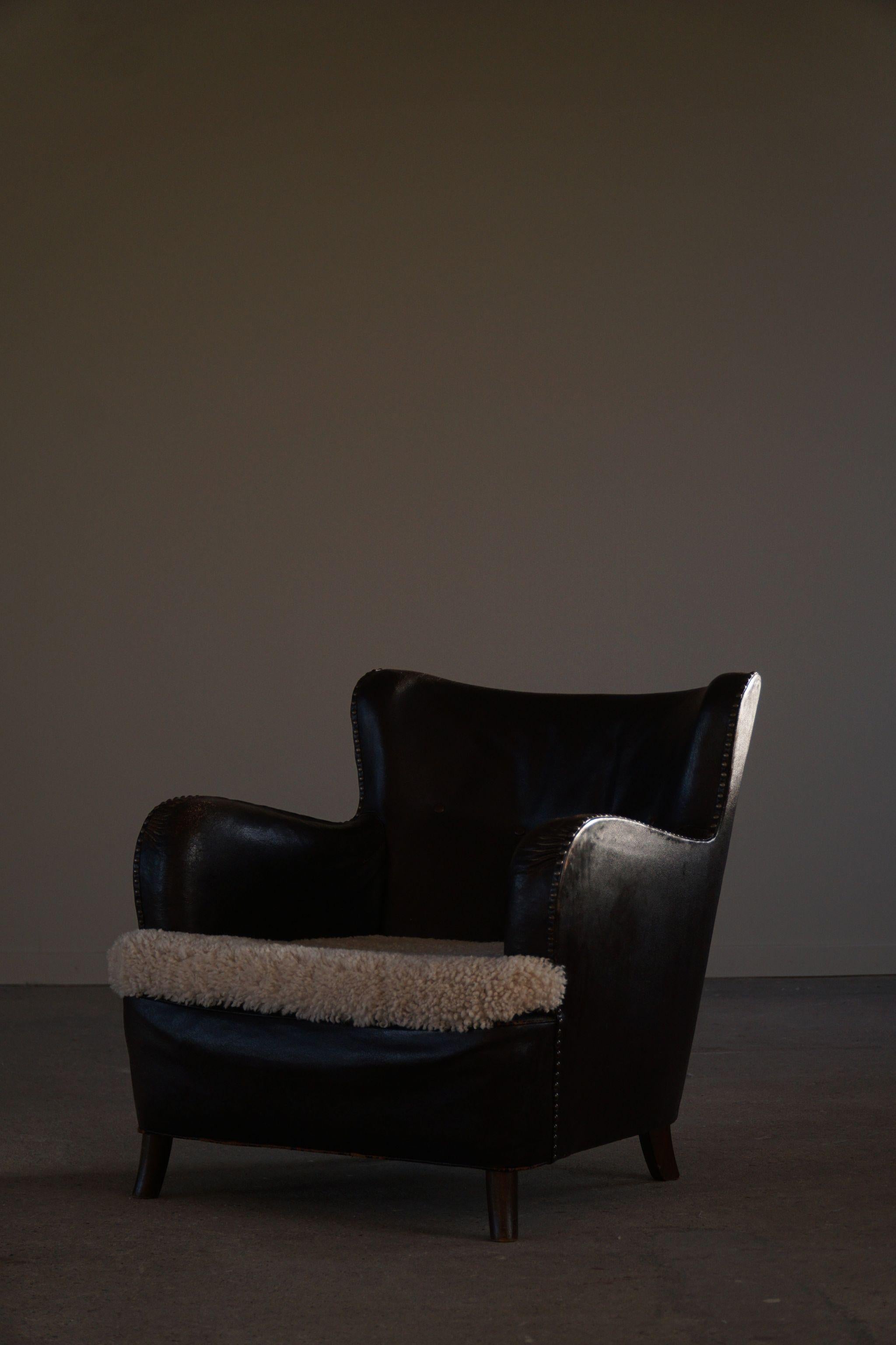Dänischer moderner Sessel aus Leder und Lammfell, Fritz Hansen, hergestellt in den 1930er Jahren (Lammleder) im Angebot