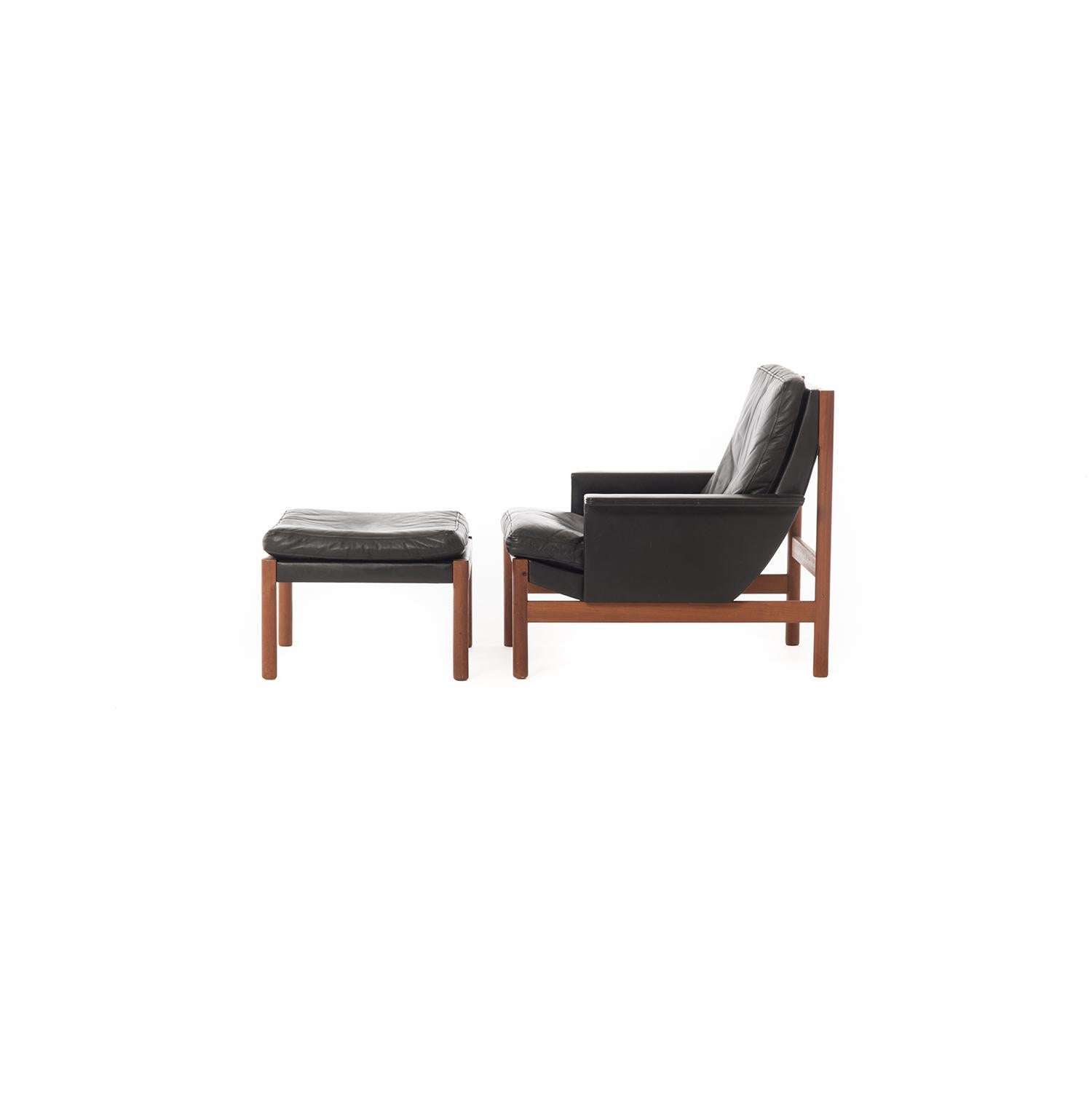 Oiled Danish Modern Easy Chair and Ottoman in Black Leather