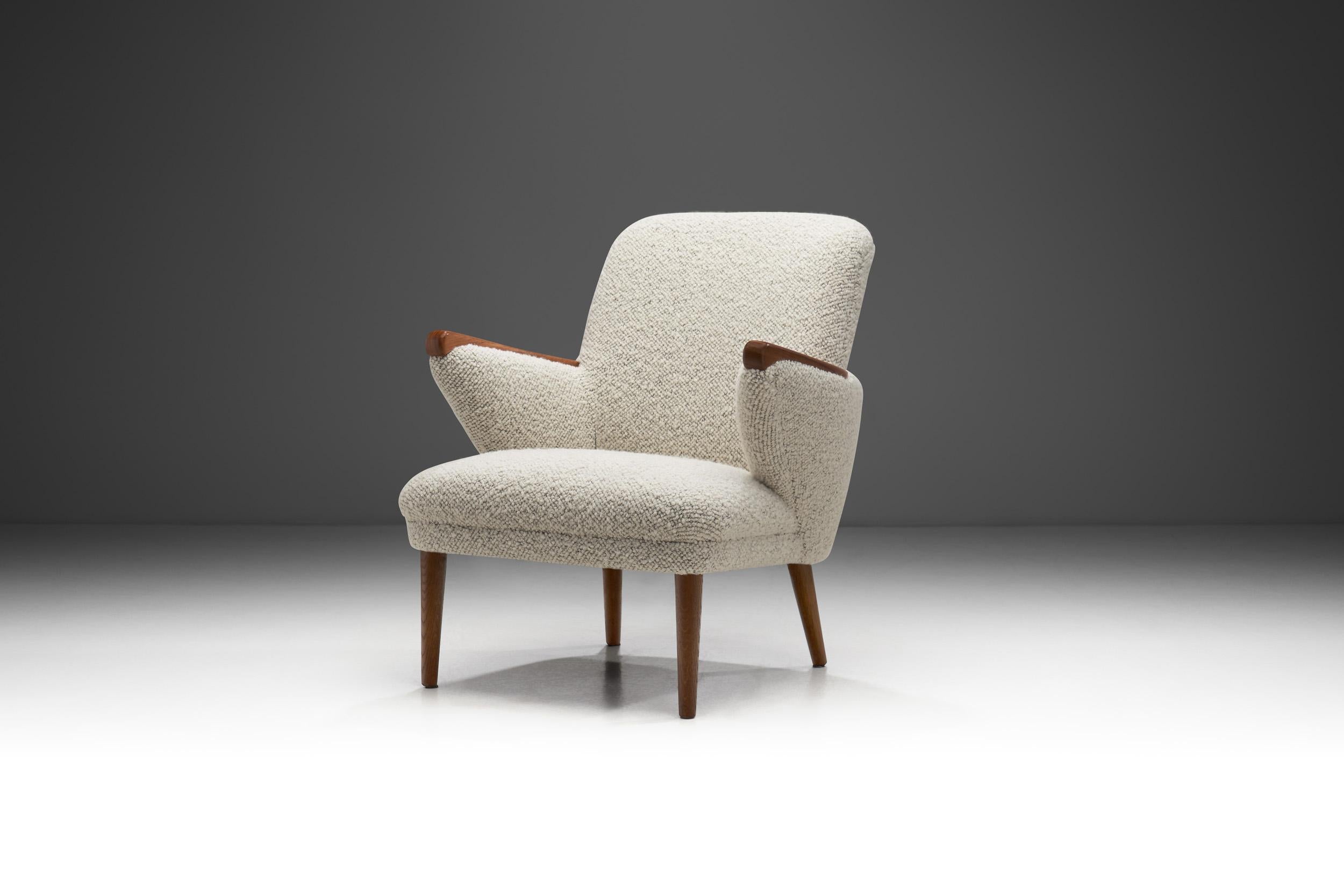 The Danish cabinetmakers' annual exhibitions began in 1927 and continued through until 1966, for almost the whole of what is now seen as the classic period of early modern Danish design. This easy chair carries subtle, but obvious features of this