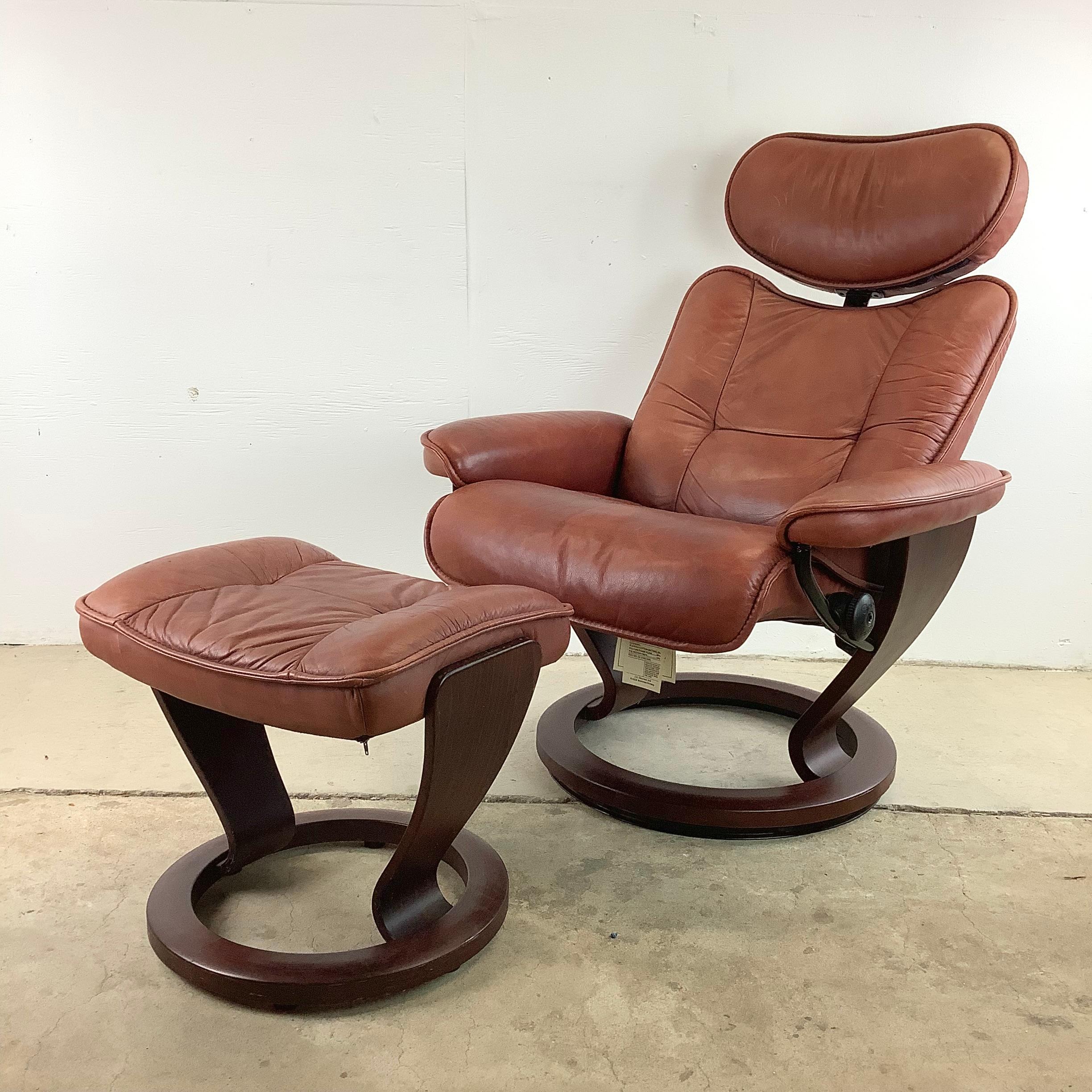 Indulge in the ultimate relaxation experience with this Ekornes Stressless Admiral Recliner Swivel Lounge Chair with Ottoman. This exquisite recliner and ottoman set combines timeless design, luxurious comfort, and exceptional craftsmanship in