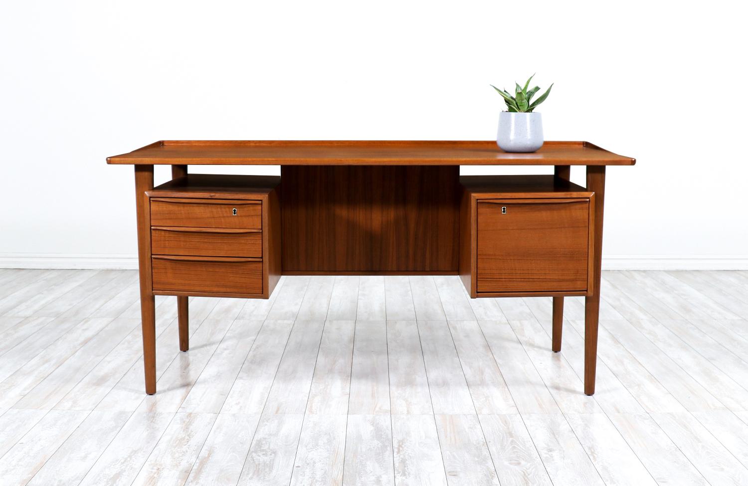 Danish modern executive desk with floating-top by Peter Lovig Nielsen.